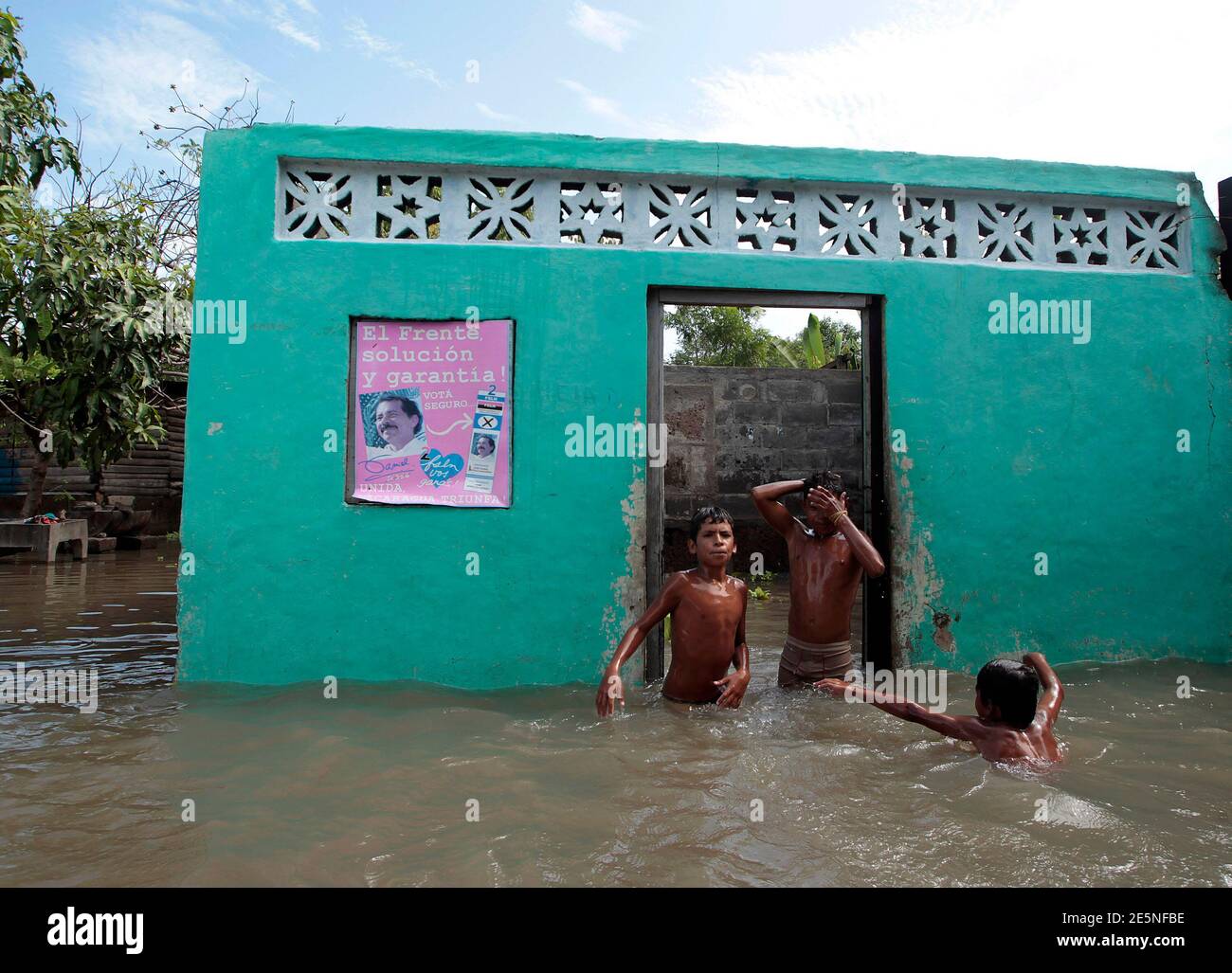 Children Play In Their Flooded House Near The Shores Of Xolotlan Lake In Tipitapa Town Some 16 Miles 26 Km North Of Managua September 8 2010 Heavy Rains In The Country Have