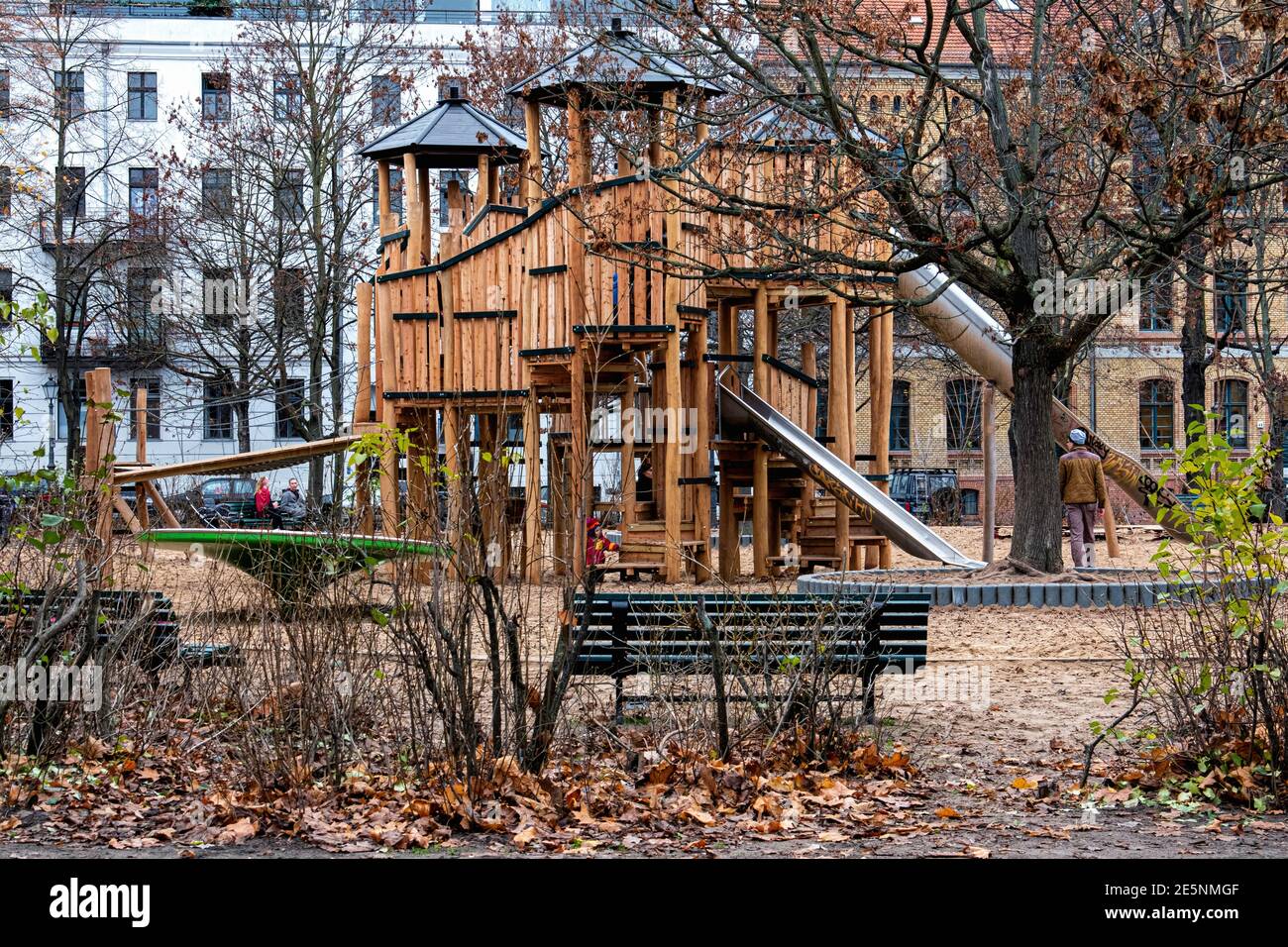 Chidlren's playground with Wooden castle and slides at Arkonaplatz,Mitte,Berlin,Germany. Kiddies play area Stock Photo