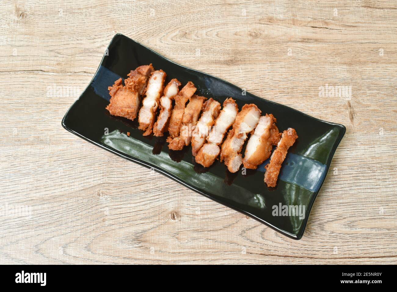 deep fried pork belly slice arranging on plate Stock Photo Alamy