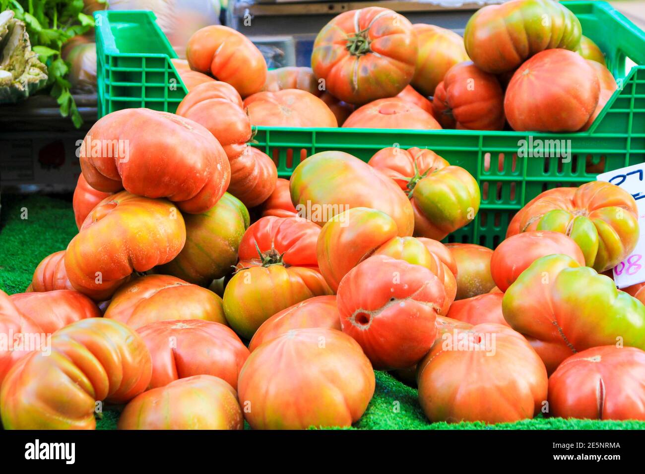 Tomatoes for sale at a farmer market stall in Spain Stock Photo - Alamy