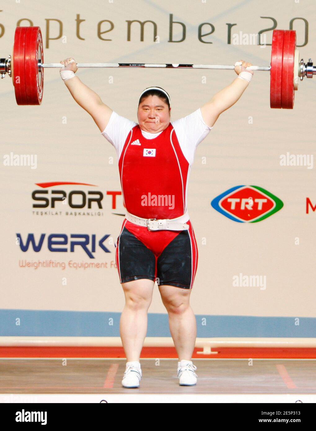 Jang Mi Ran of South Korea competes in the women's 75kg weightlifting
