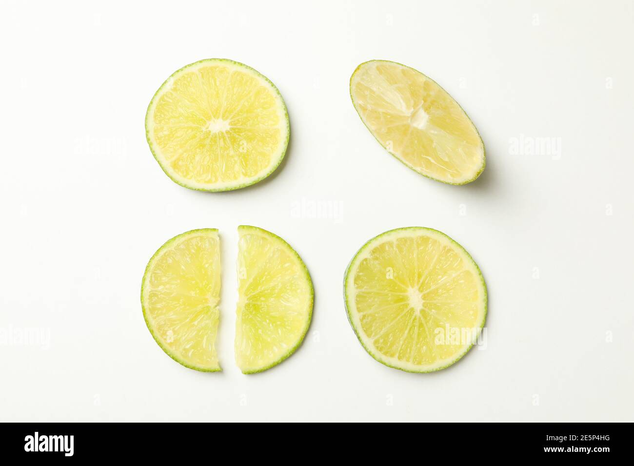 Flat lay with ripe lime on white background Stock Photo