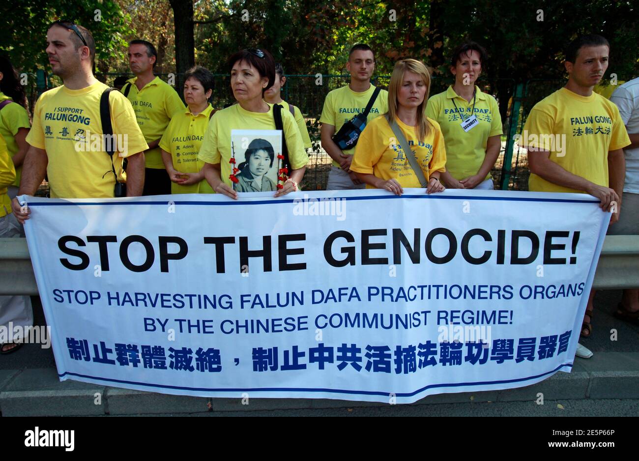 Falun Gong practitioners hold portraits of fellow Chinese practitioners as  they protest against China's crackdown on Falun Gong followers in front of  the Chinese embassy in Bucharest September 24, 2011. Falun Gong was banned  in China in 1999 and over ...