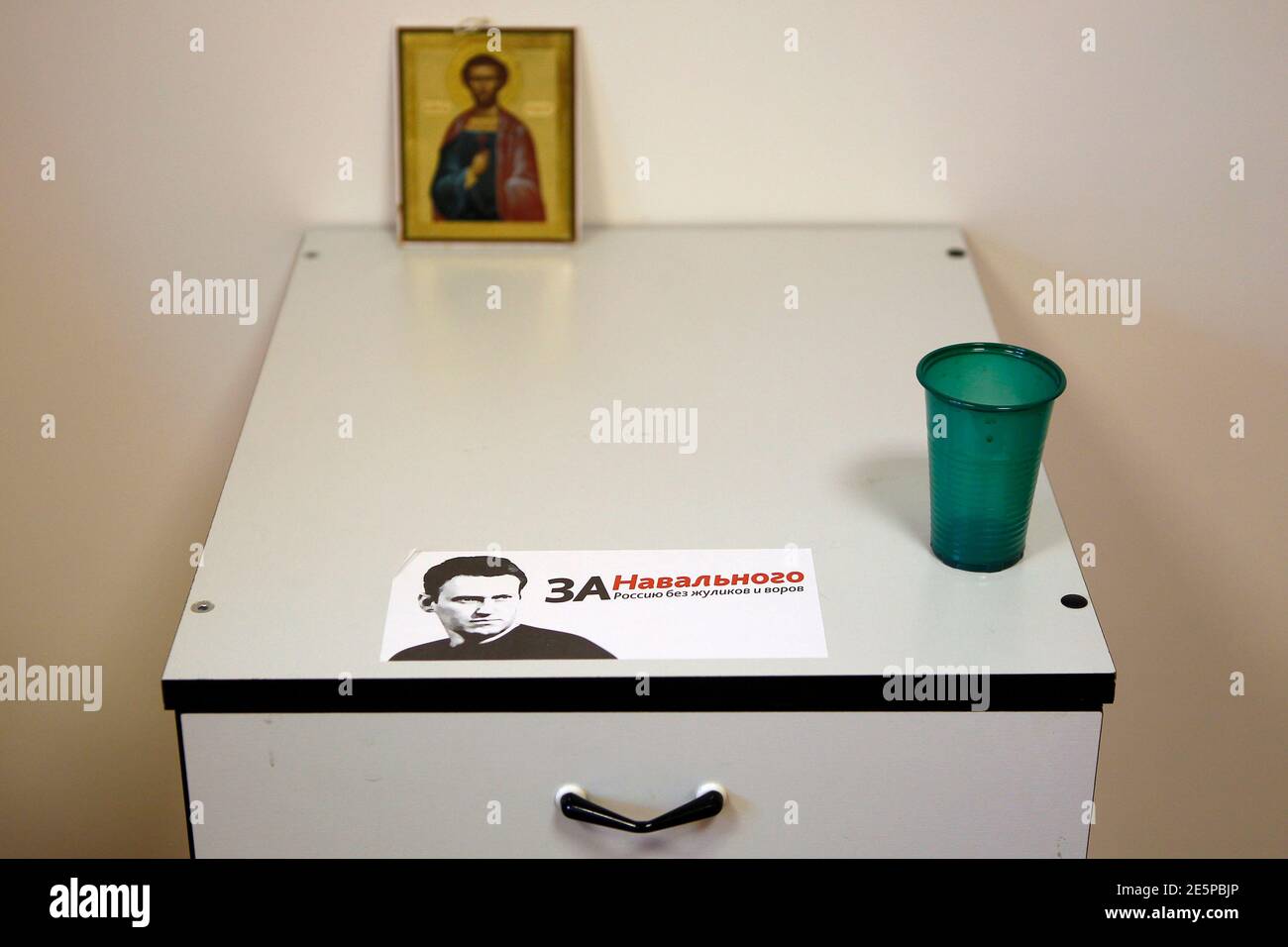 A sticker bearing the image of Russian opposition leader and anti-graft  blogger Alexei Navalny is seen in his office in the city of Kirov, April  16, 2013. Russian protest leader Navalny is