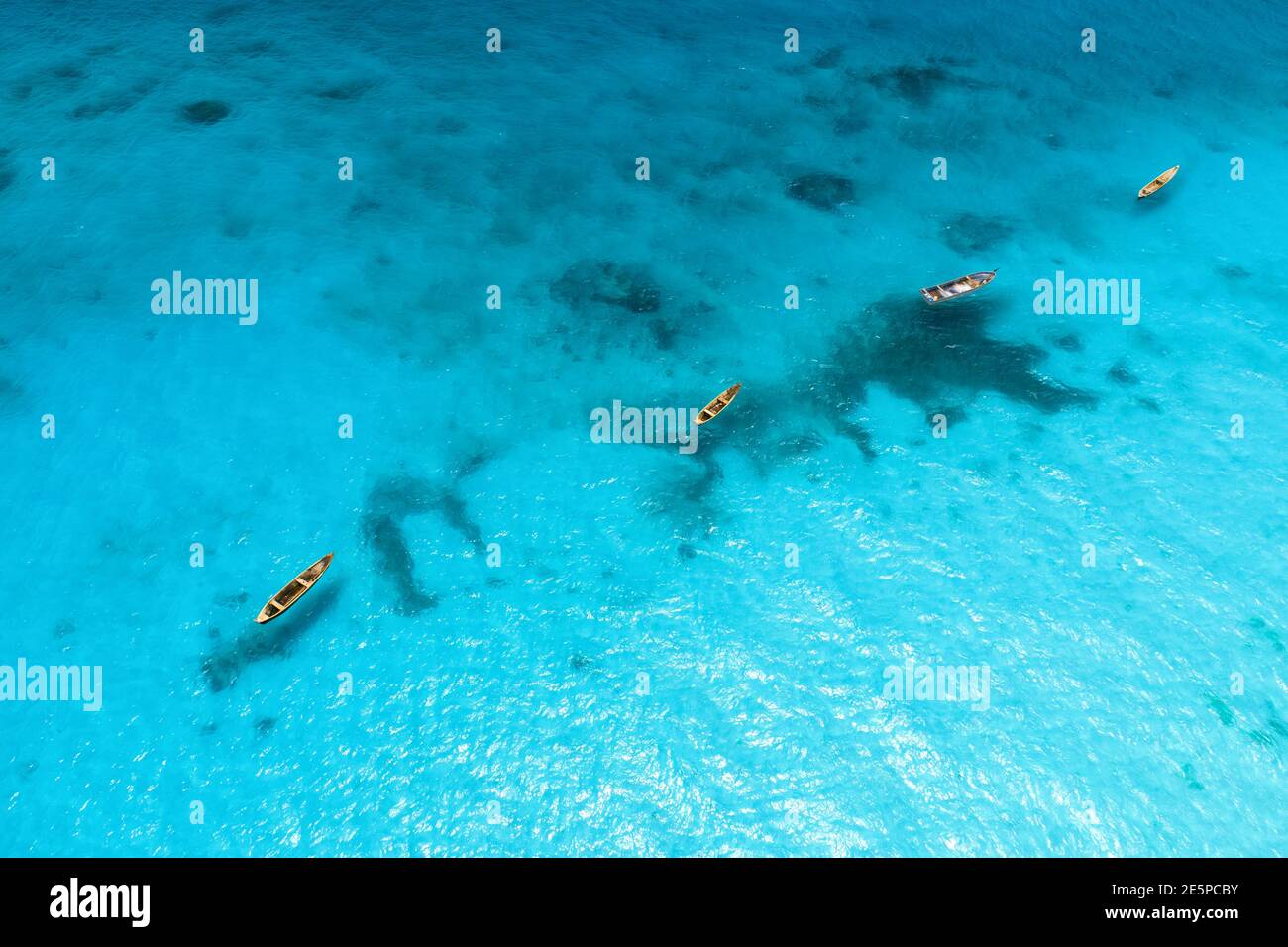 Aerial view of the fishing boats in clear blue water Stock Photo - Alamy