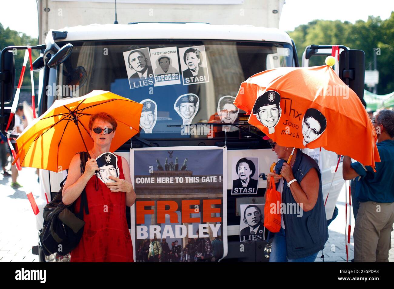 Protesters attend a demonstration against secret monitoring programmes PRISM, TEMPORA, INDECT and showing solidarity with whistleblowers Edward Snowden, Bradley Manning and others in Berlin July 27, 2013.  REUTERS/Pawel Kopczynski (GERMANY  - Tags: CRIME LAW POLITICS CIVIL UNREST) Stock Photo