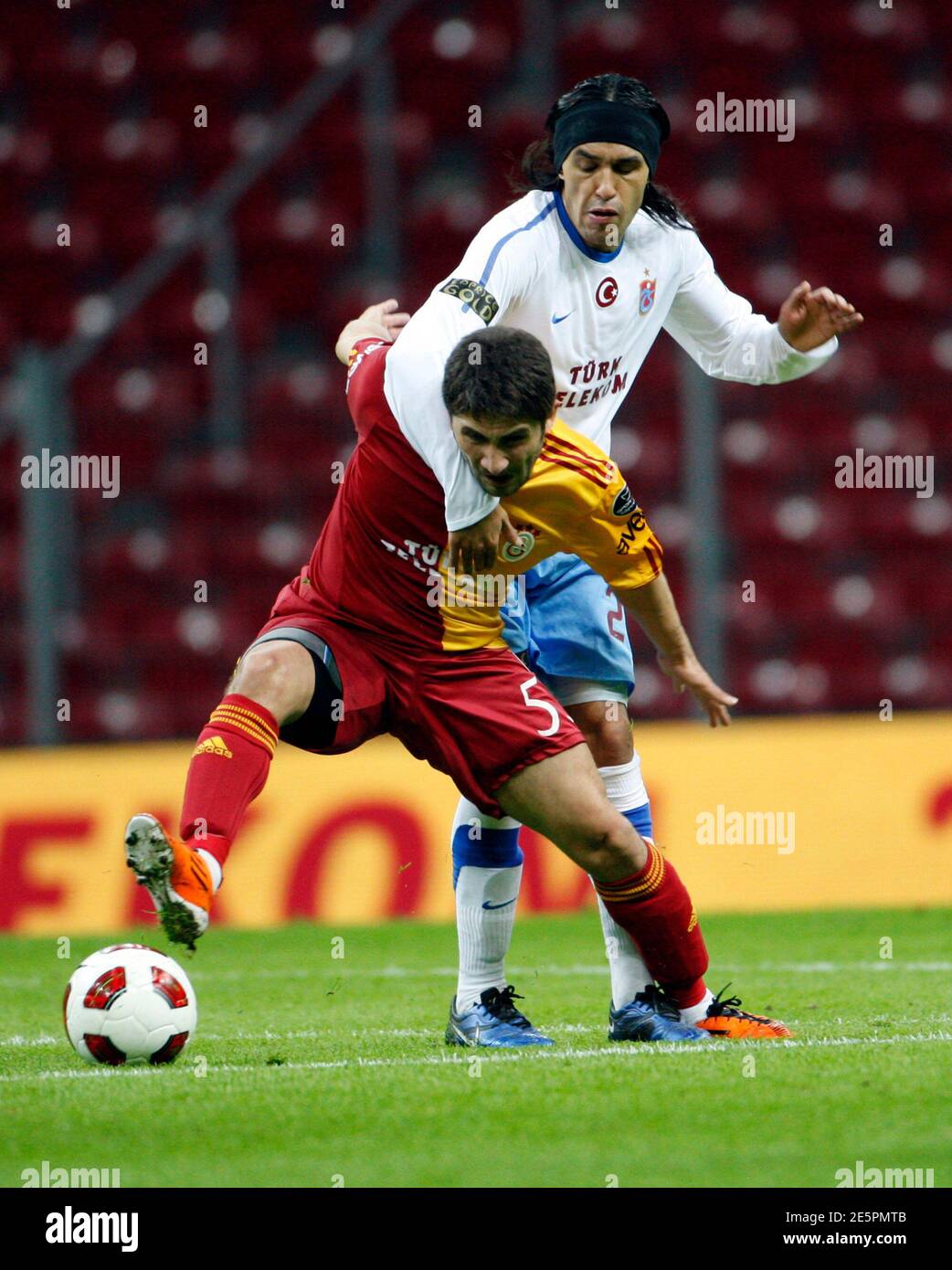 https www alamy com galatasarays sabri sarioglu front fights for the ball with trabzonspors gustavo colman during their turkey super league soccer match at the turk telekom arena stadium in istanbul april 10 2011 the match was played before an empty 52000 seat turk telekom arena on sunday after galatasaray was handed a one match ban when fans threw objects onto the pitch during their march 18 derby against fenerbahce reutersosman orsal turkey tags sport soccer image399411051 html
