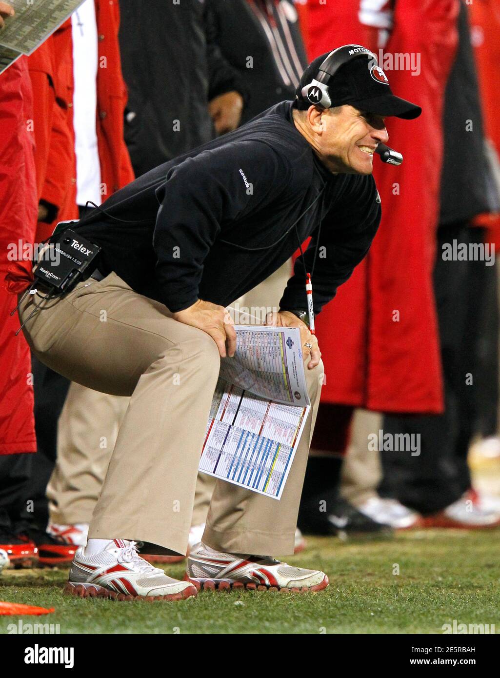 San Francisco 49ers head coach Jim Harbough reacts to a play against the New York Giants during the NFL NFC Championship game in San Francisco, California, January 22, 2012. REUTERS/Mike Blake (UNITED STATES  - Tags: SPORT FOOTBALL) Stock Photo