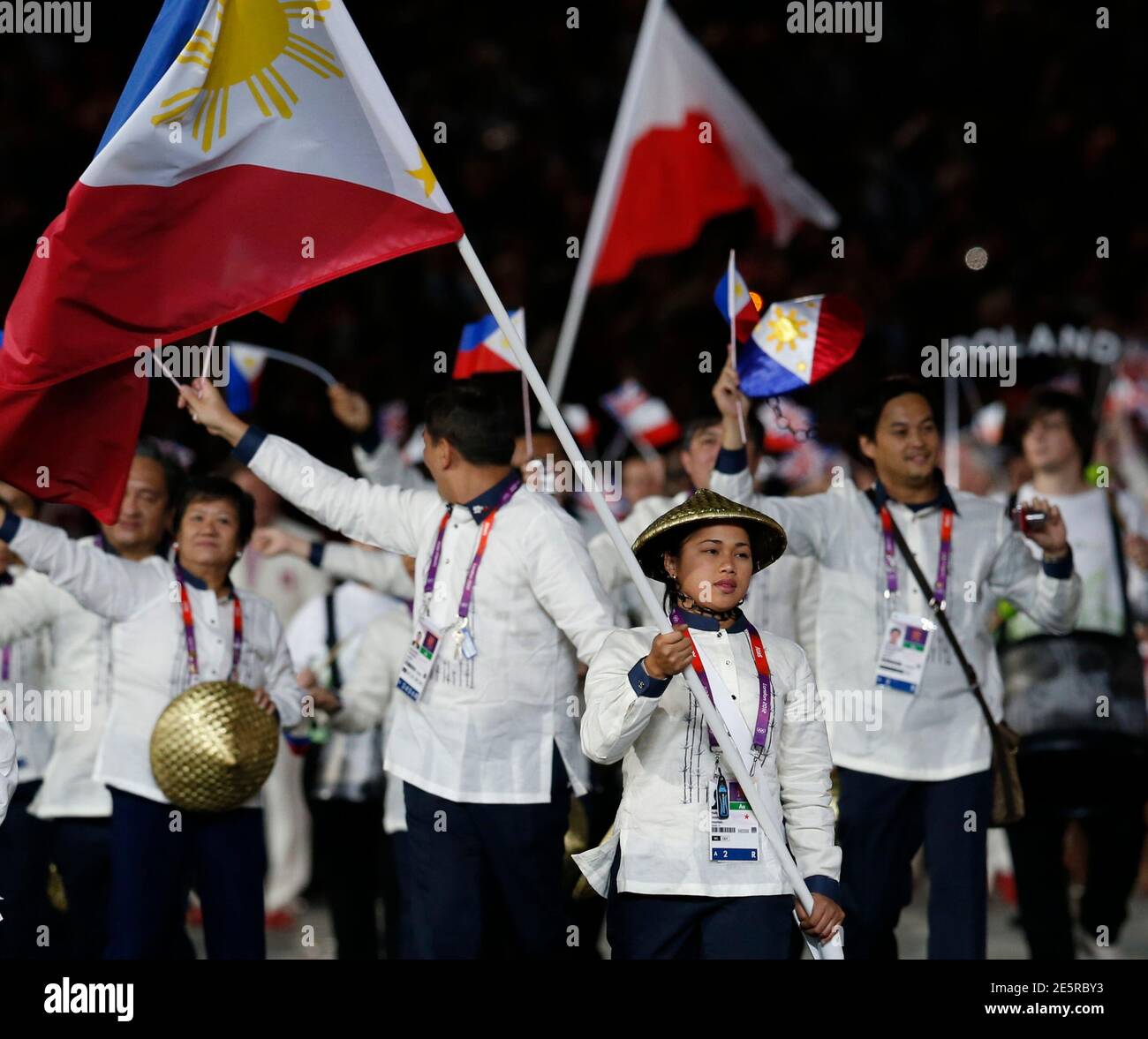 Philippines' flag bearer Hidilyn Diaz holds the national flag as she