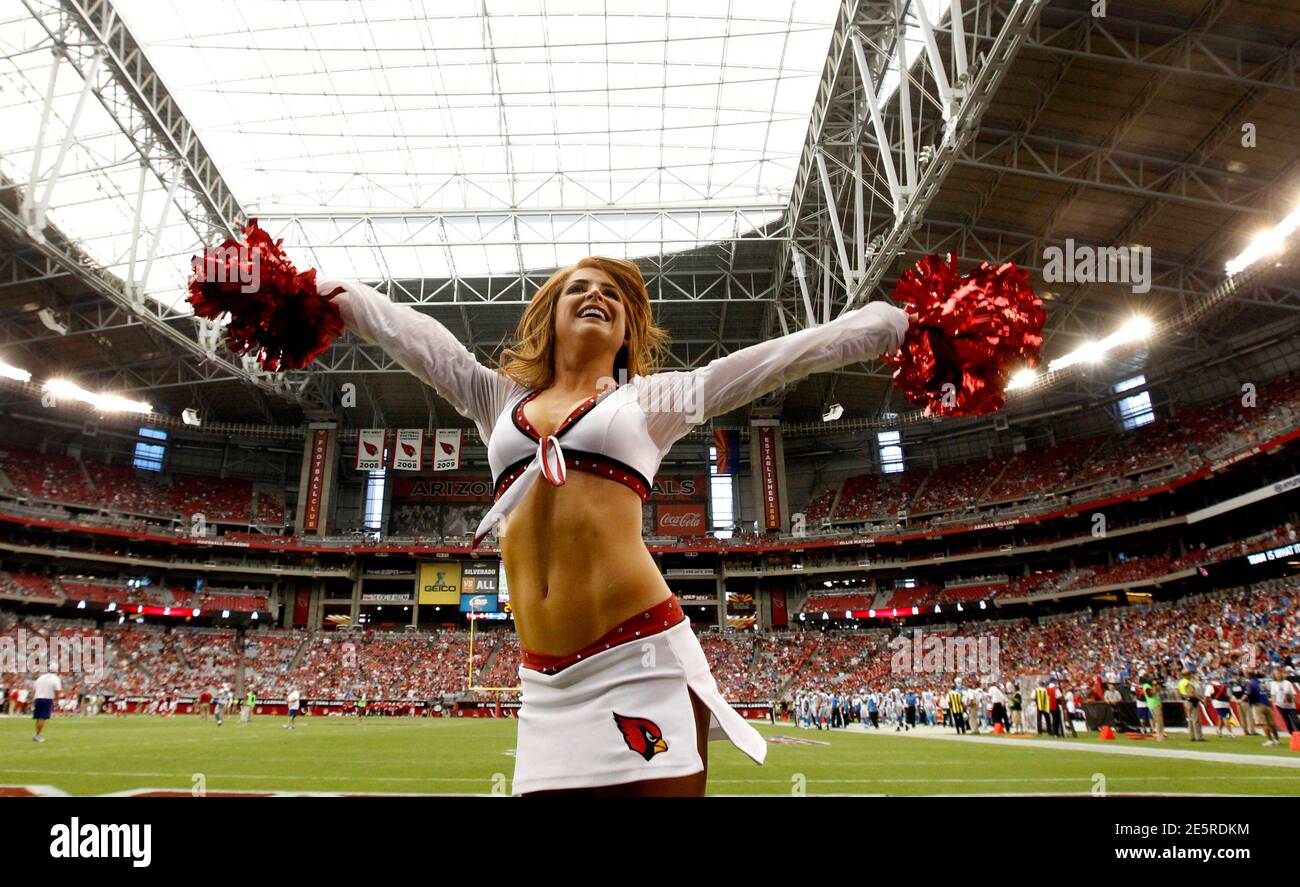 An Arizona Cardinals cheerleader performs during the first half of their NFL football game against the Detroit Lions in Phoenix, Arizona, September 15, 2013. REUTERS/Ralph D. Freso (UNITED STATES - Tags: SPORT FOOTBALL) Stock Photo