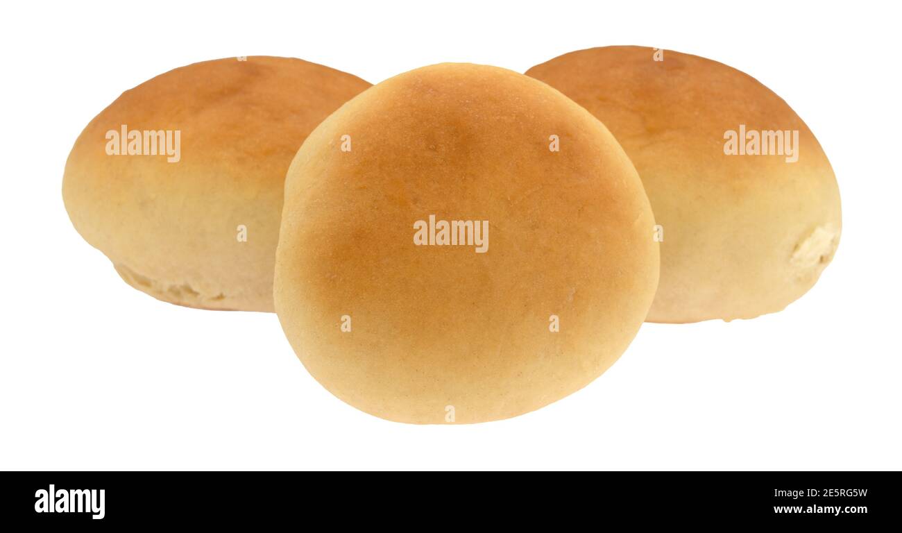 Side view of three fresh homemade yeast rolls isolated on a white background. Stock Photo