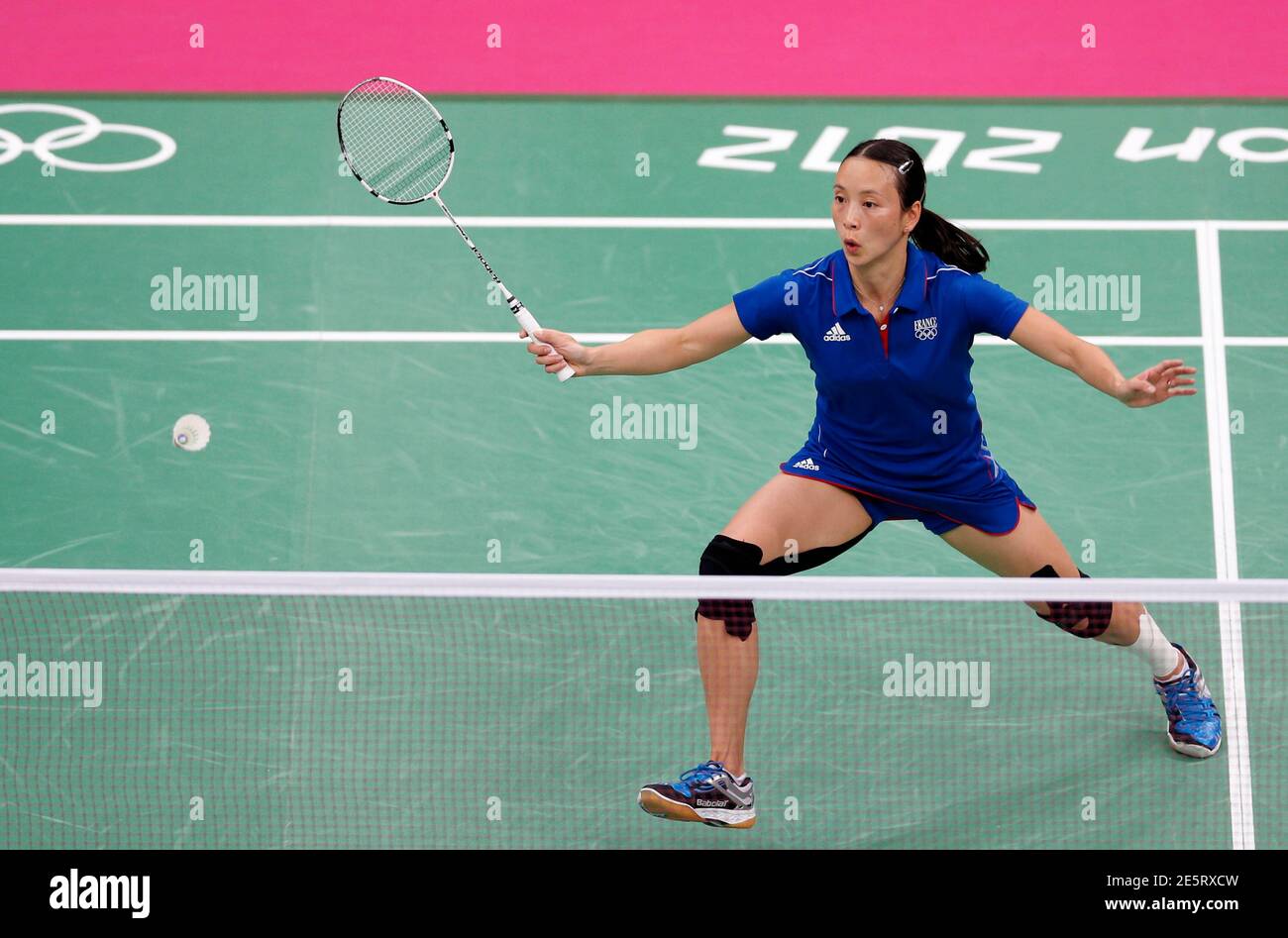 France's Pi Hongyan plays against Hong Kong's Yip Pui Yin during their  women's singles round of 16 badminton match during the London 2012 Olympic  Games at the Wembley Arena August 1, 2012.