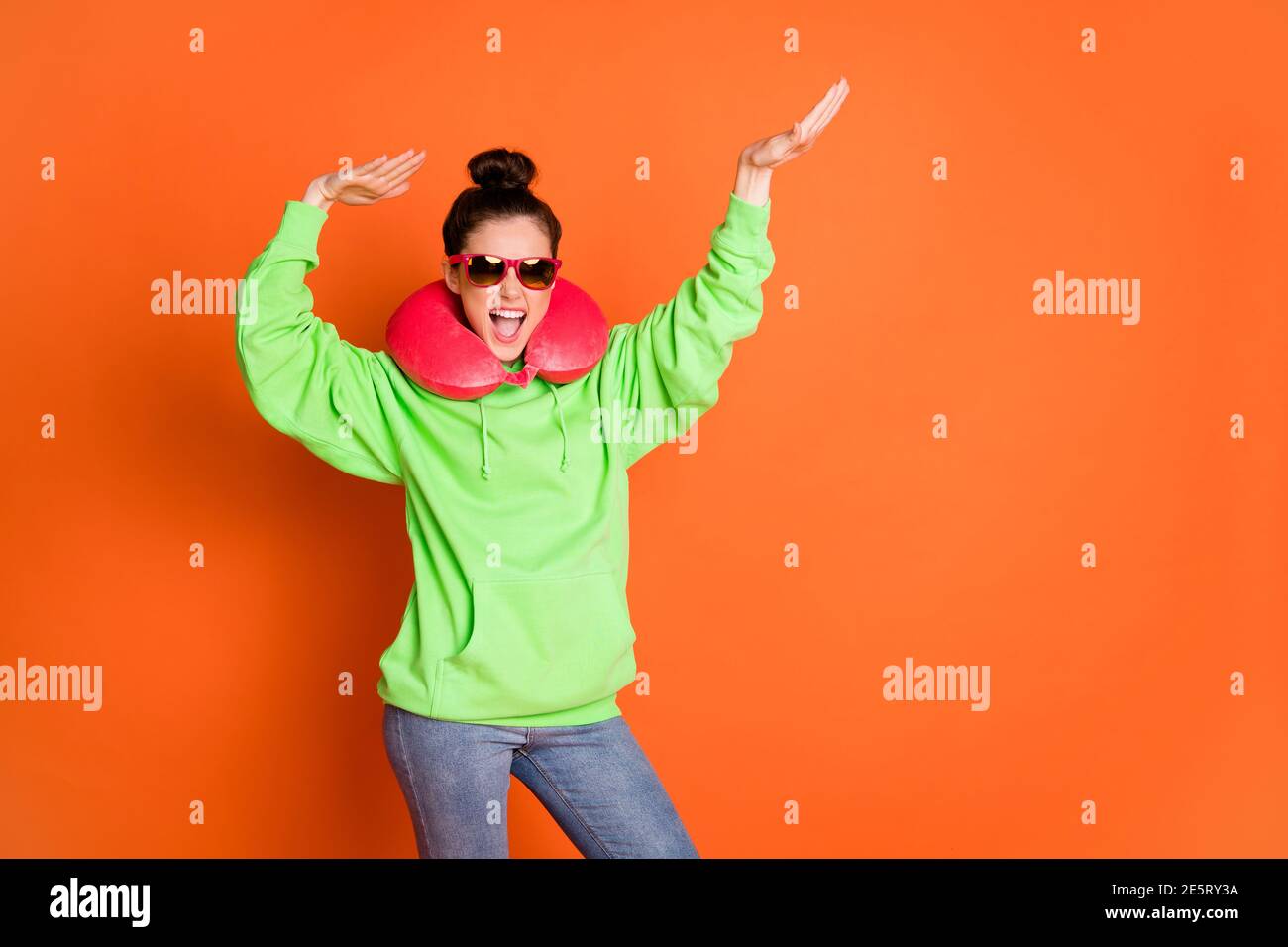 Photo of sweet dancing young lady dressed green sweatshirt neck pillow