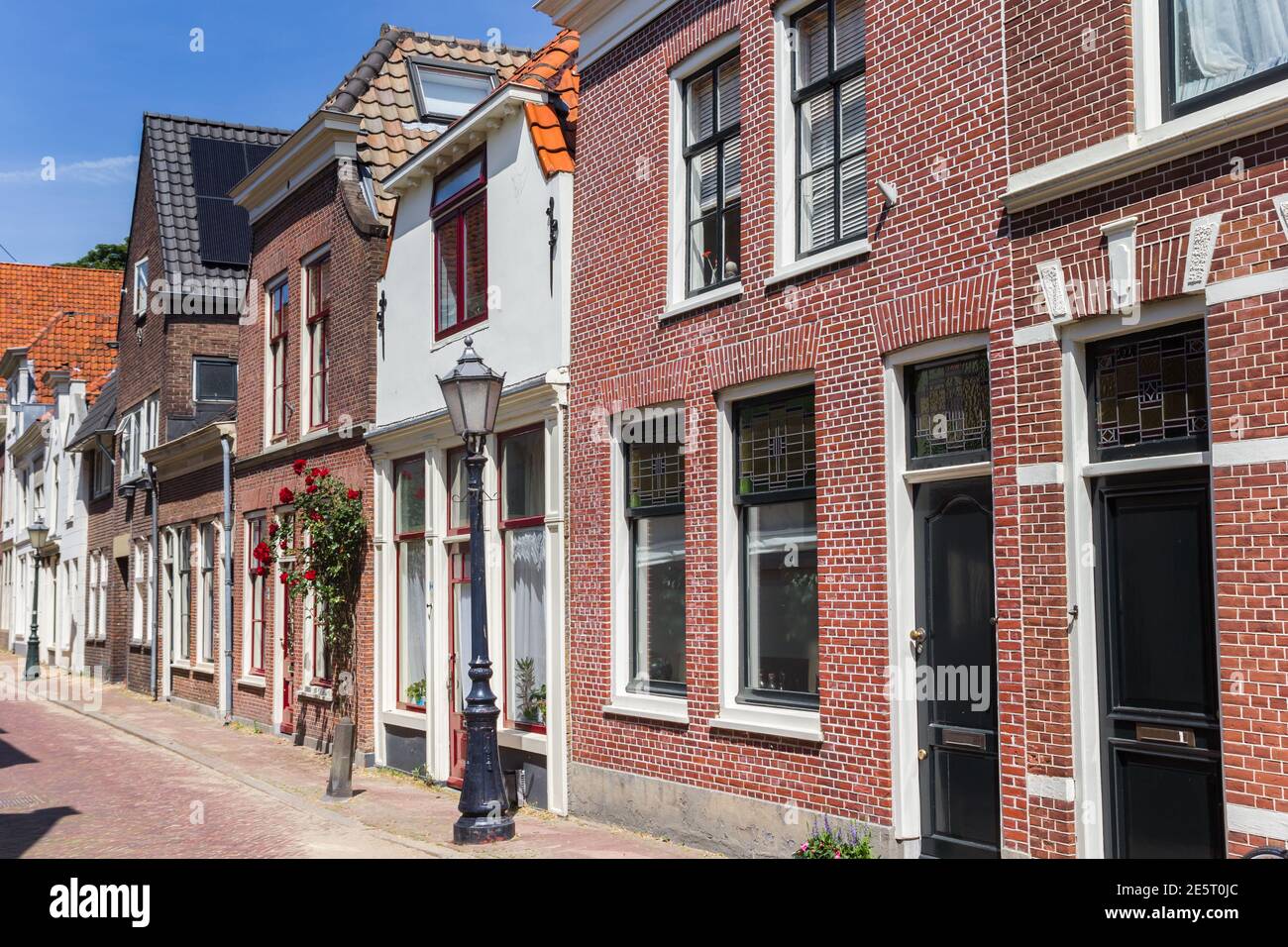 Street with old houses in the historic center of Gouda, Netherlands