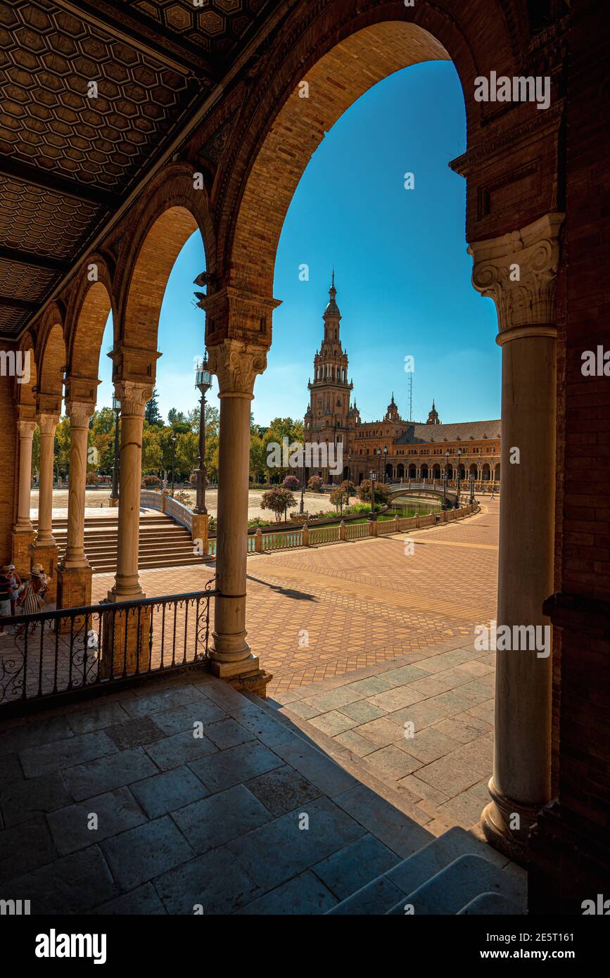 Sevilla, Spain, wide view on the famous landmark Plaza de Espana, day light sunny, blue sky.Architectural details of the palace. Stock Photo