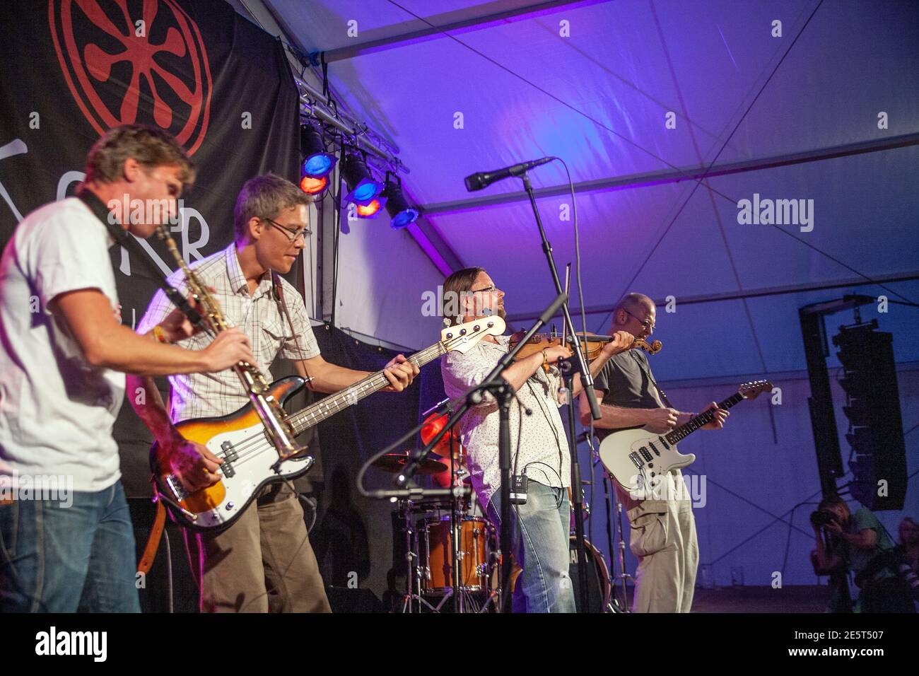 Swedish folk-rock group Hoven Droven performing in Korrö folk music festival Photo: Bo Arrhed Stock Photo