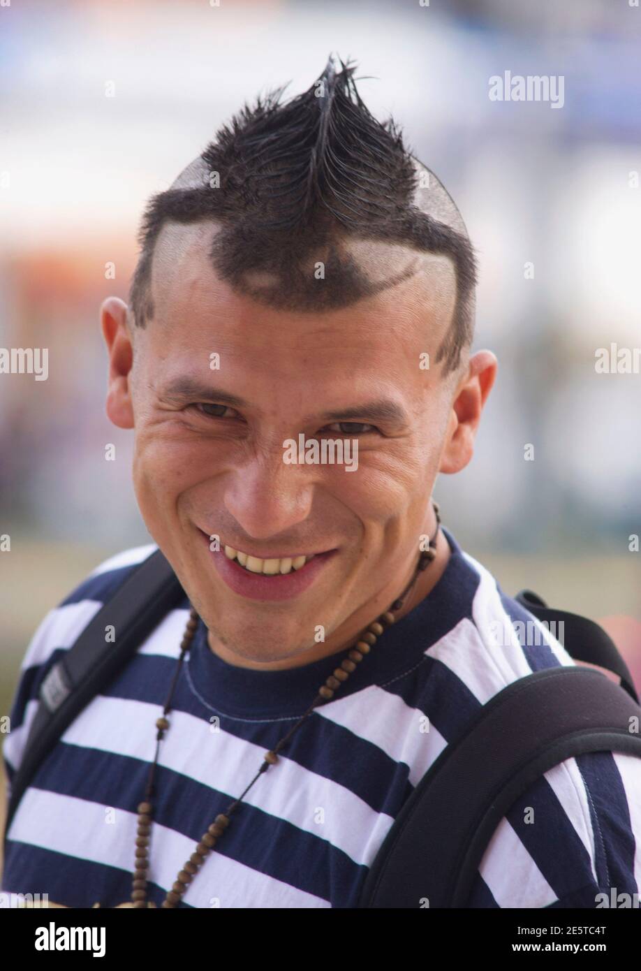Rudy Parraga, from Guayaquil, shows his Galapagos iguana-inspired hair  design on a street in Quito August 15, 2012. REUTERS/Guillermo Granja  (ECUADOR - Tags: SOCIETY HEADSHOT Stock Photo - Alamy