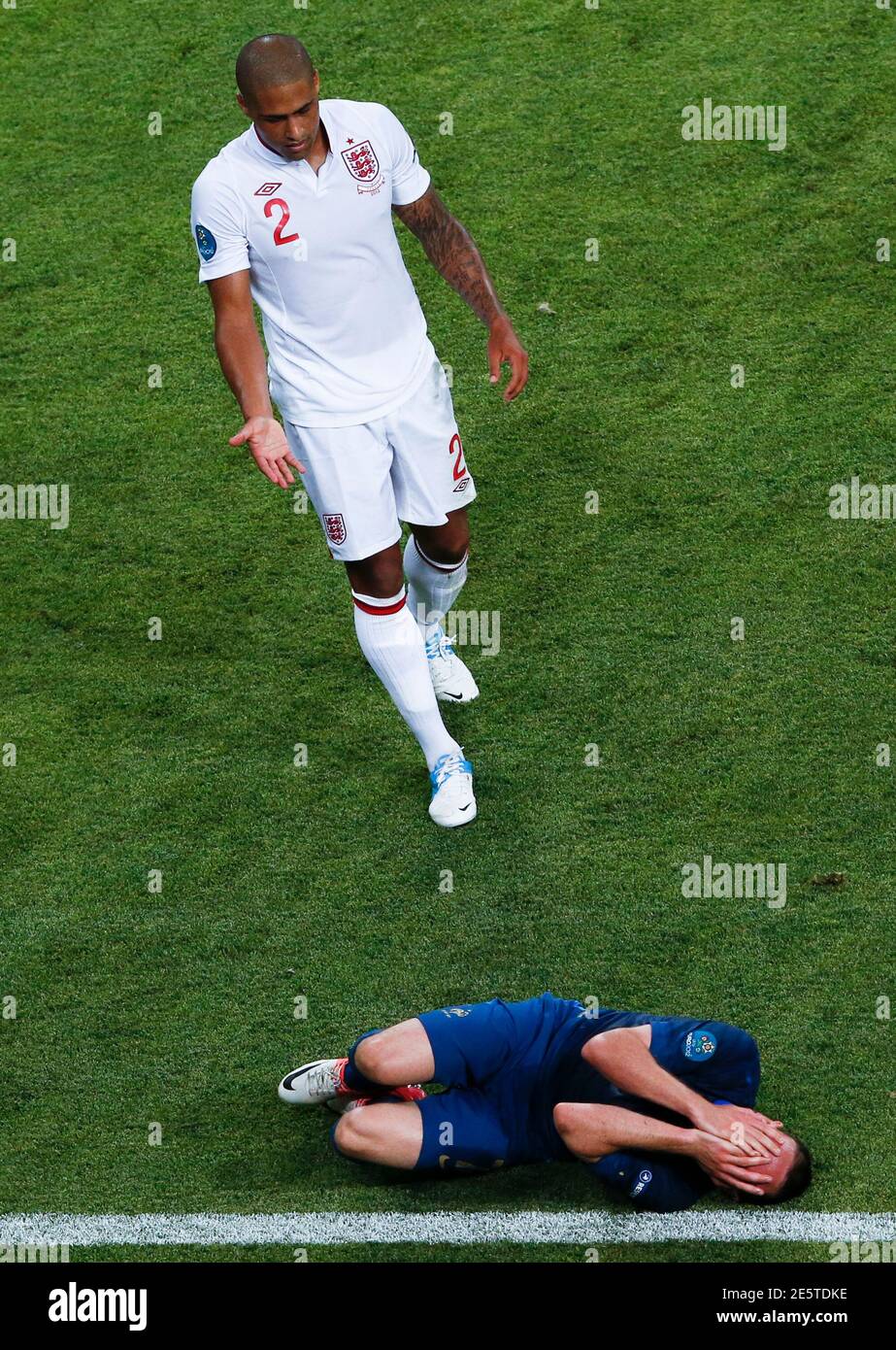 England's Glen Johnson (top) gestures at France's Franck Ribery during the Euro 2012 Group D soccer match at Donbass Arena in Donetsk, June 11, 2012.     REUTERS/Alessandro Bianchi (UKRAINE  - Tags: SPORT SOCCER) Stock Photo