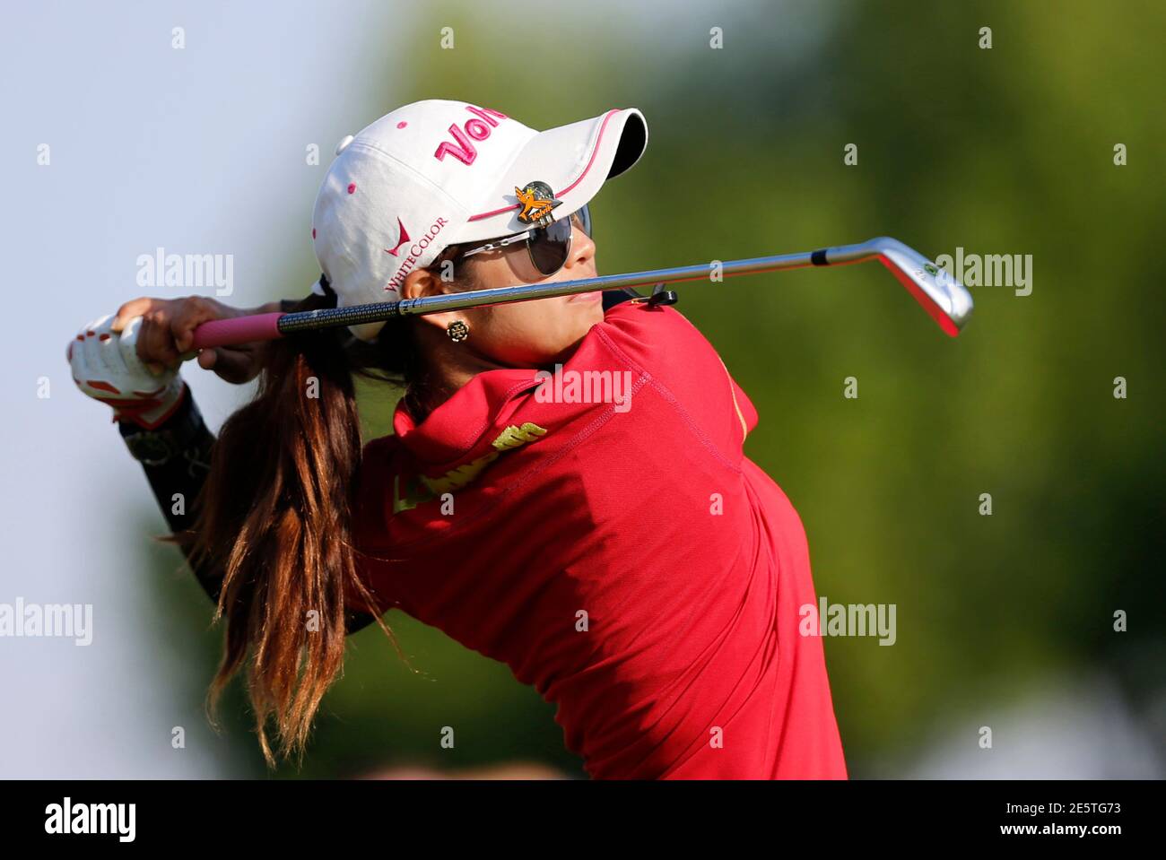 Pornanong Phatlum of Thailand tees off on the 15th hole during Dubai Ladies Masters  golf tournament in Dubai December 7, 2013. REUTERS/Ahmed Jadallah (UNITED  ARAB EMIRATES - Tags: SPORT GOLF Stock Photo - Alamy