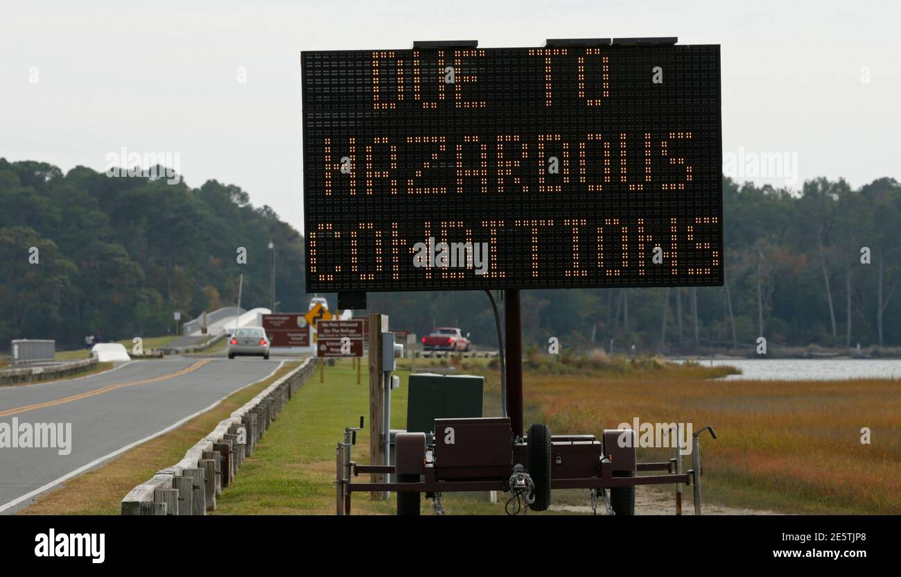 The road to Assateague Island is closed due to potentially hazardous material washing ashore in Chincoteague, Virginia,  October 29,  2014.  On Tuesday night, the  Antares 14-story rocket, blasted off from nearby NASA's Wallops Flight Facility and burst into flames moments later.  REUTERS/Kevin Lamarque  (UNITED STATES - Tags: SCIENCE TECHNOLOGY DISASTER ENVIRONMENT) Stock Photo