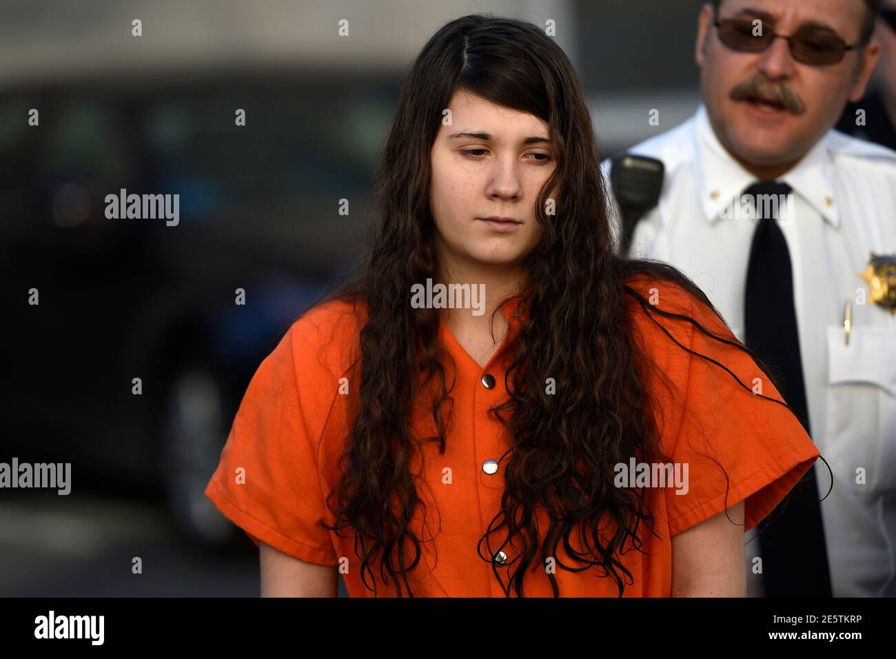 Miranda Barbour, 19, the woman dubbed the so-called Craigslist killer  suspect, is led into court by sheriff deputies in Sunbury, Pennsylvania  April 1, 2014. Barbour and her husband, Elytte Barbour, 22, have