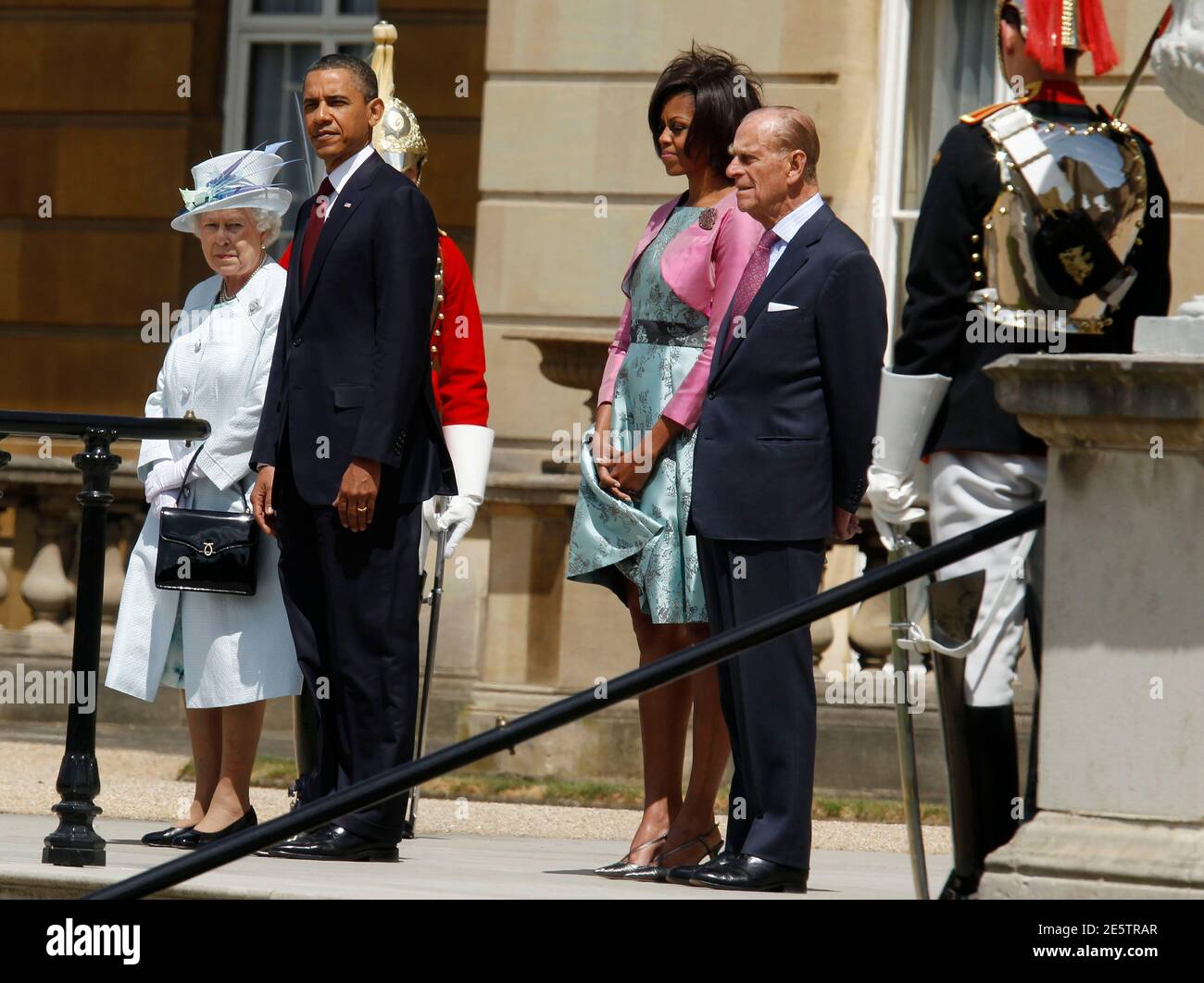 U.S. President Barack Obama (2nd L), first lady Michelle Obama (3rd R), Queen Elizabeth II (L) and Prince Phillip, Duke of Edinburg (2nd R), participate in an official arrival ceremony on the Buckingham Palace Terrace stairs in London May 24, 2011.         REUTERS/Larry Downing      (BRITAIN - Tags: POLITICS) Stock Photo