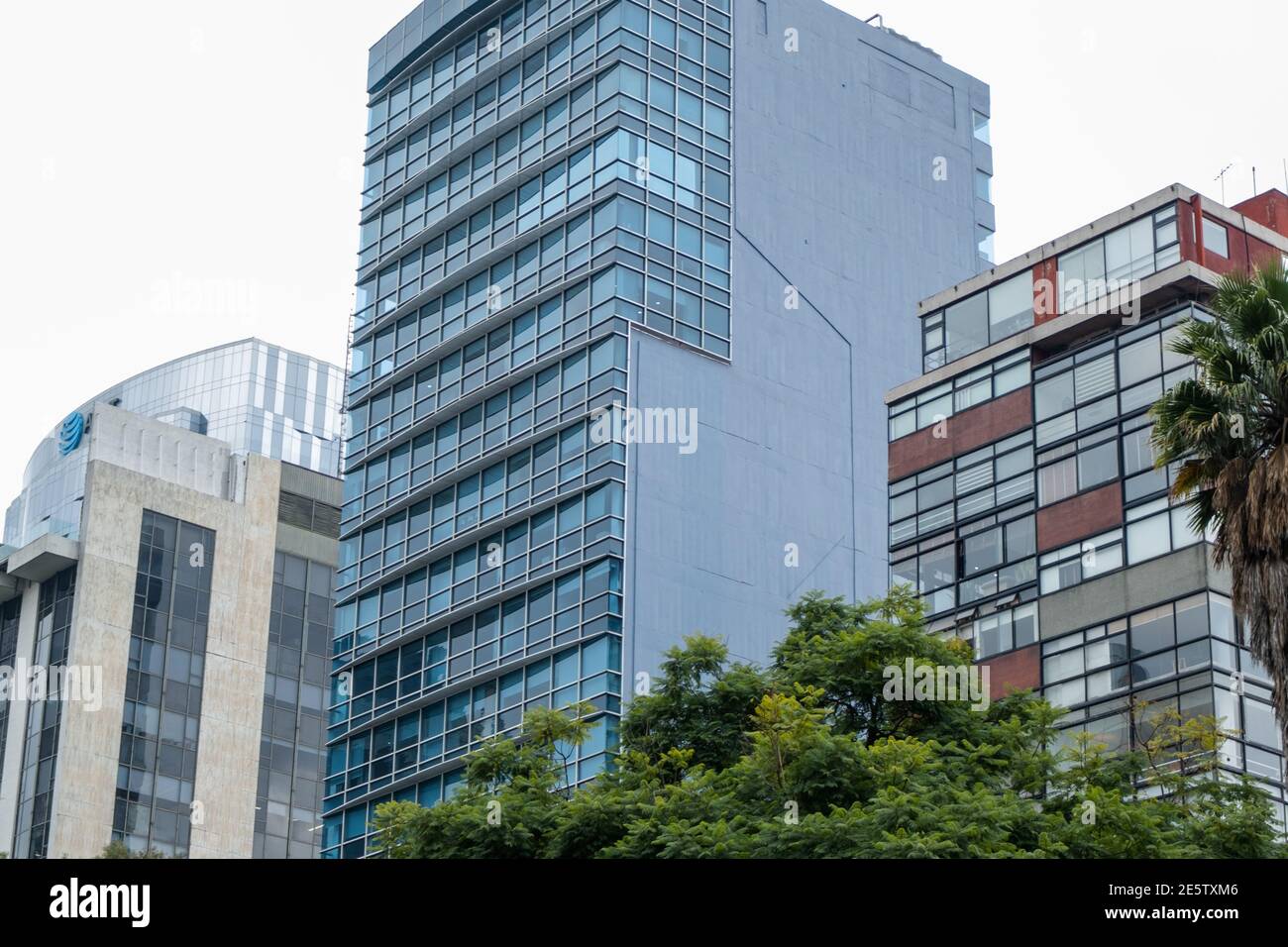 Office and apartment buildings with cloudy sky as background Stock ...