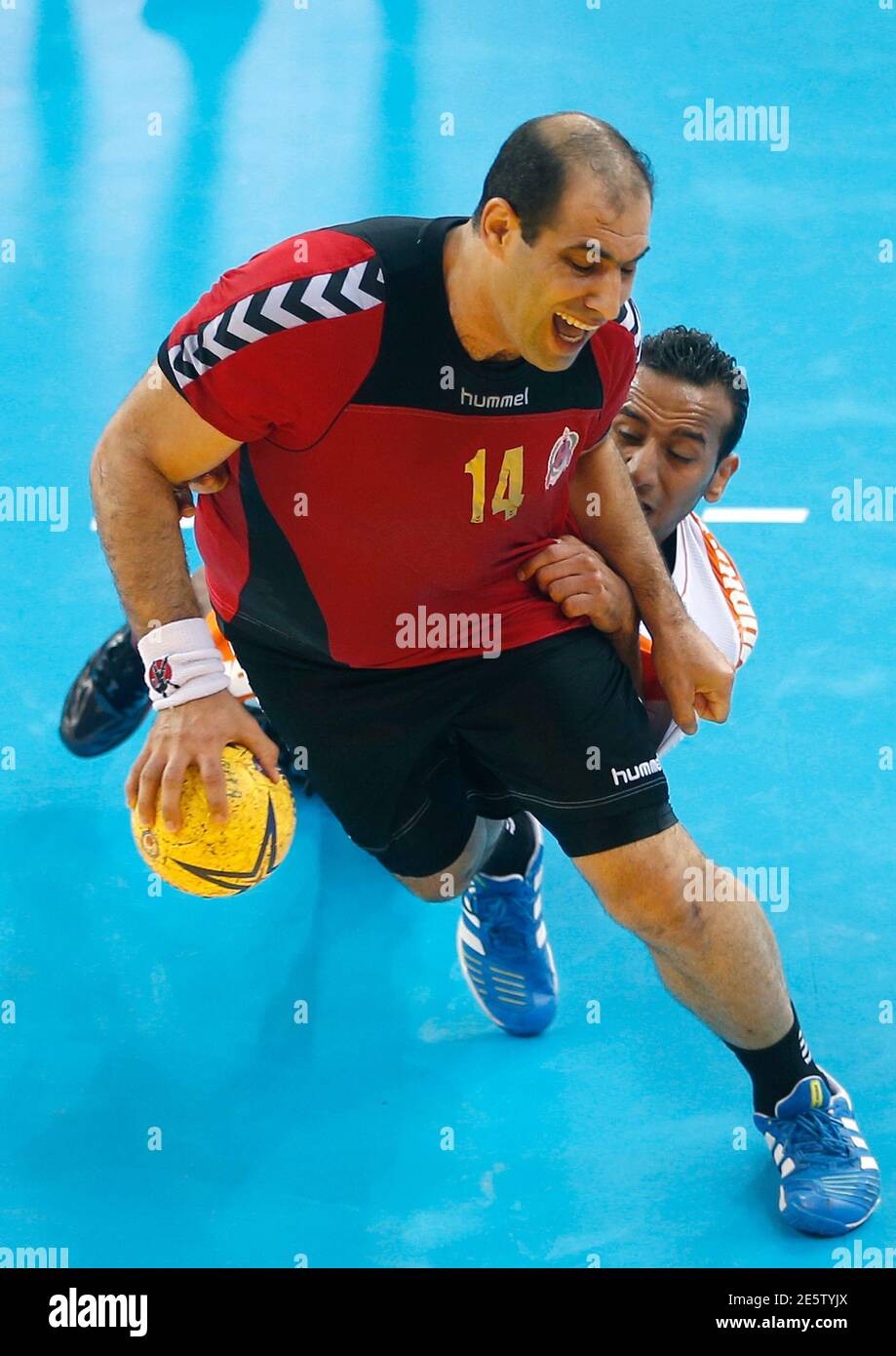 Bassel Alrayes L Of Qatar S Al Rayyan Tries To Pass Next To Abbas Alsaffar Of Saudi Arabi S Mudhar During The Asian Handball Club Championship In Doha November 10 2012 Reuters Fadi Al Assaad Qatar