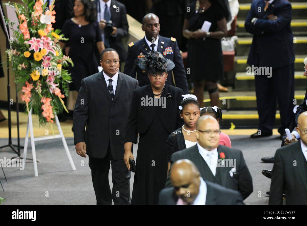 The family of Rev. Clementa Pinckney walks through TD Arena attend his