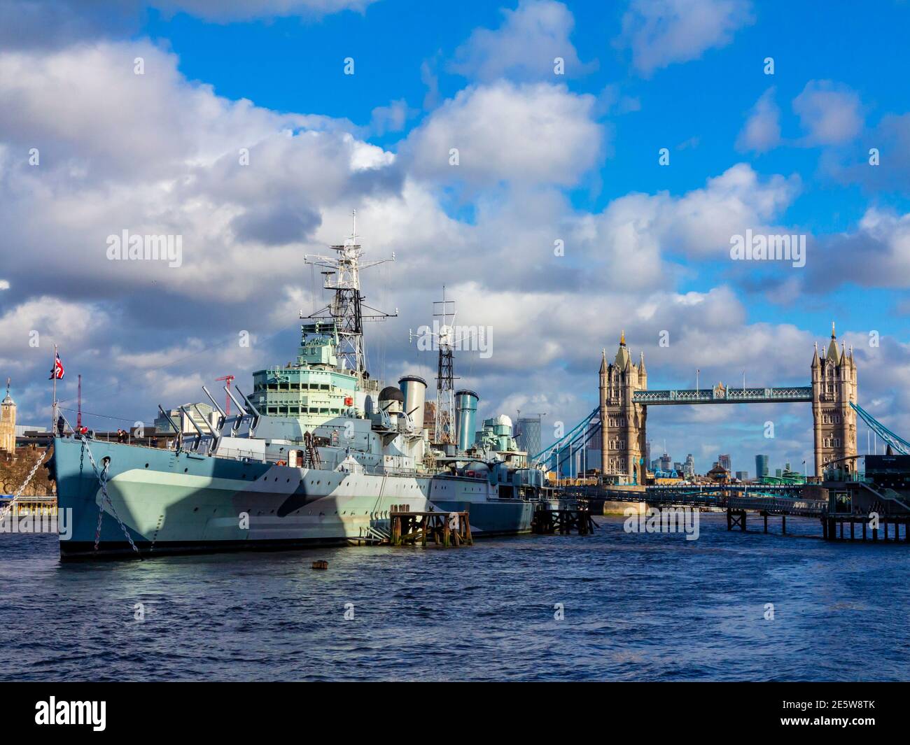 HMS Belfast a British Royal Navy Town Class light cruiser launched in 1936 now a floating museum ship on the River Thames in London England UK Stock Photo