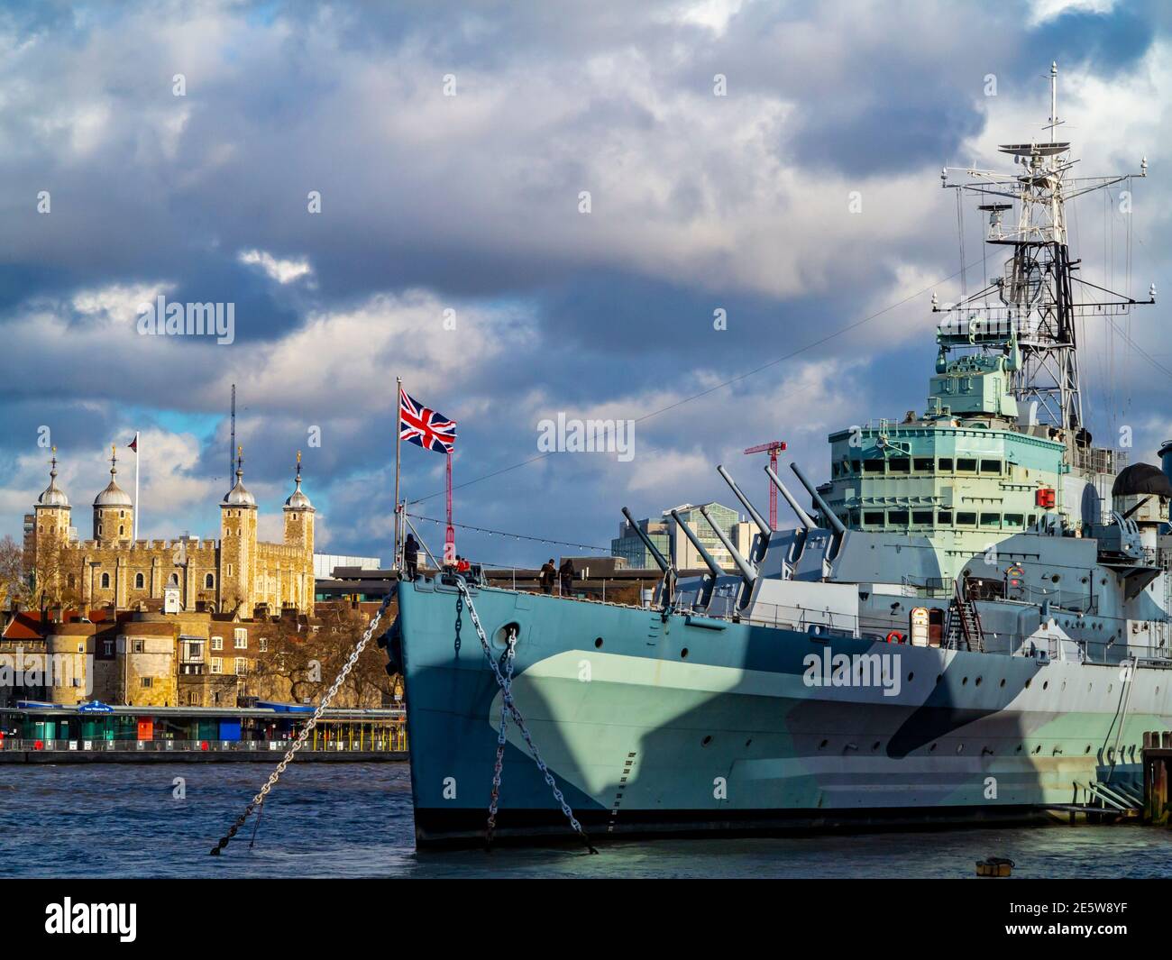HMS Belfast a British Royal Navy Town Class light cruiser launched in 1936 now a floating museum ship on the River Thames in London England UK Stock Photo