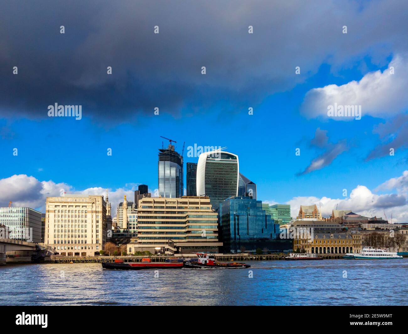 View of 20 Fenchurch Street or the Walkie Talkie office building designed by Rafael Vinoly in the City of London England UK with other offices nearby. Stock Photo