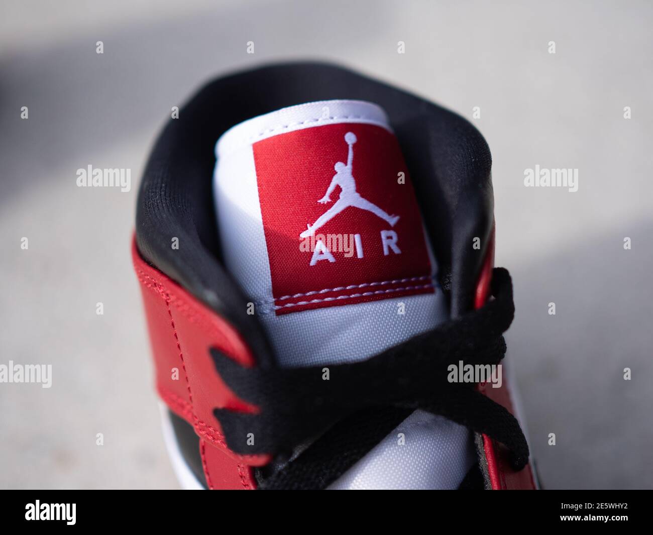 BLOTZHEIM, FRANCE - 6 NOVEMBER 2020 : Nike Air Jordan 1 Mid white/gym  red-black sneaker Stock Photo - Alamy
