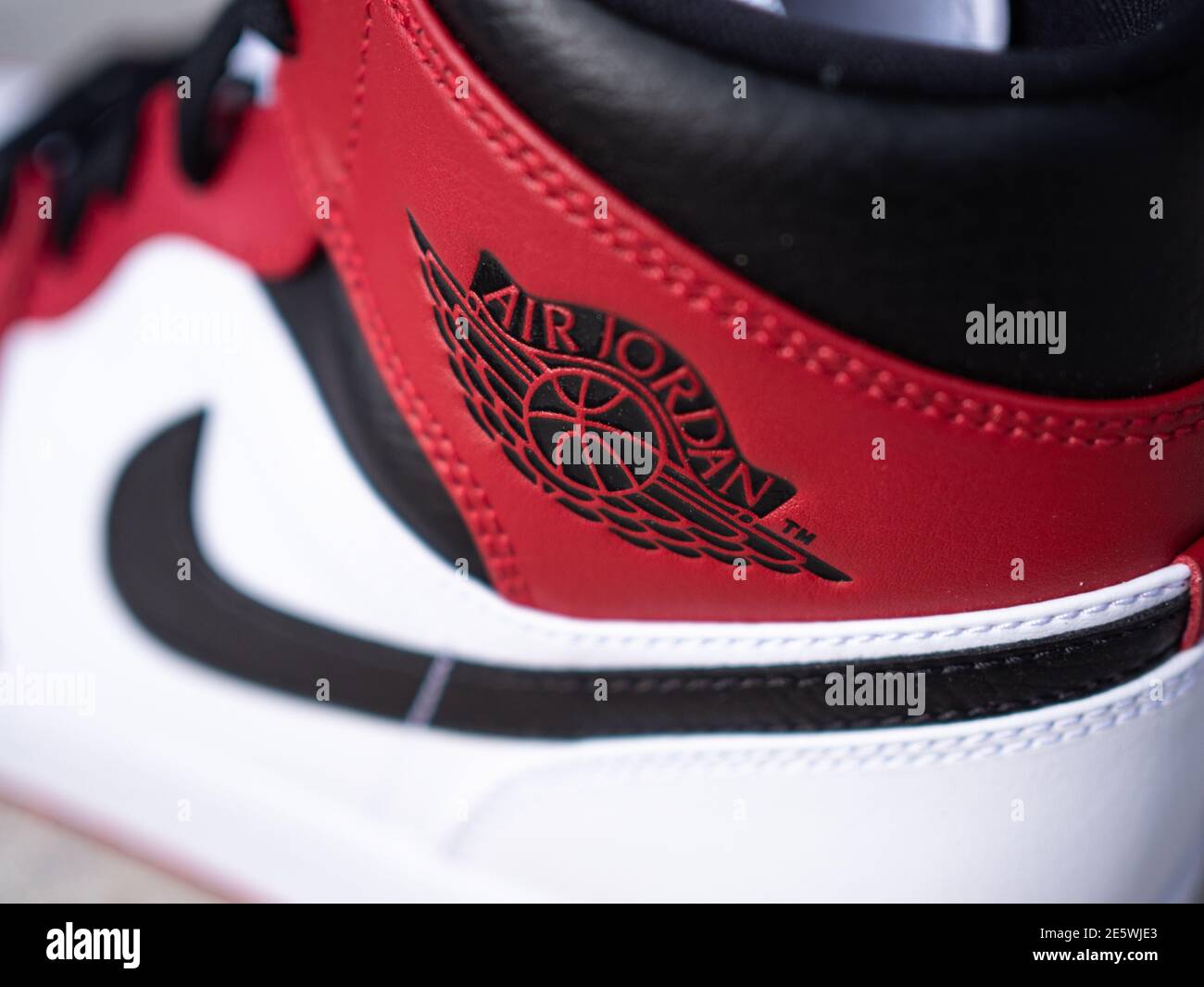 BLOTZHEIM, FRANCE - 6 NOVEMBER 2020 : Nike Air Jordan 1 Mid white/gym  red-black sneaker Stock Photo - Alamy