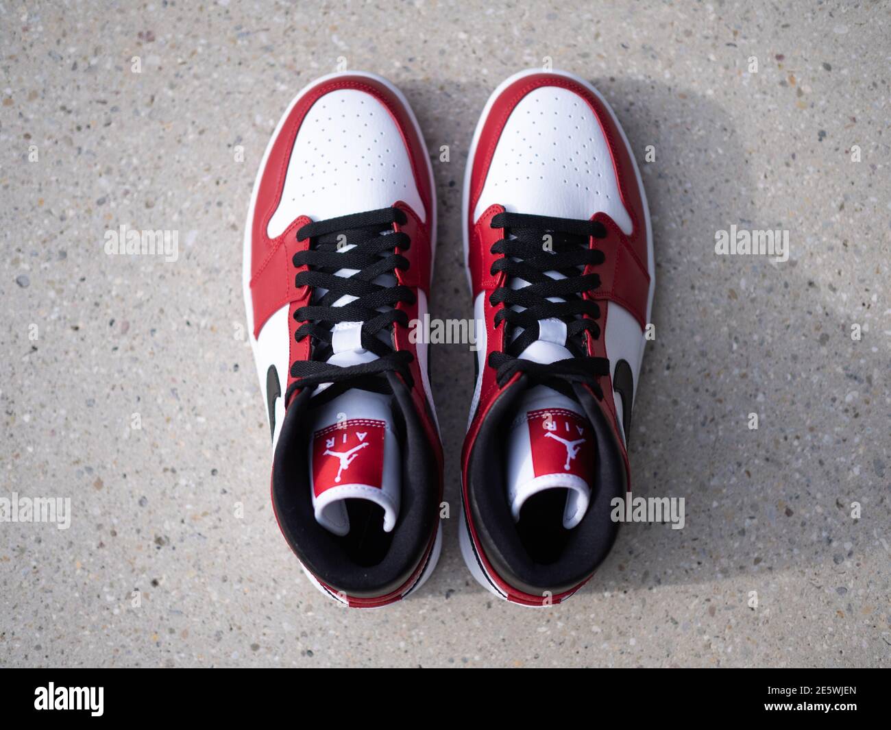 BLOTZHEIM, FRANCE - 6 NOVEMBER 2020 : Nike Air Jordan 1 Mid white/gym  red-black sneaker Stock Photo - Alamy