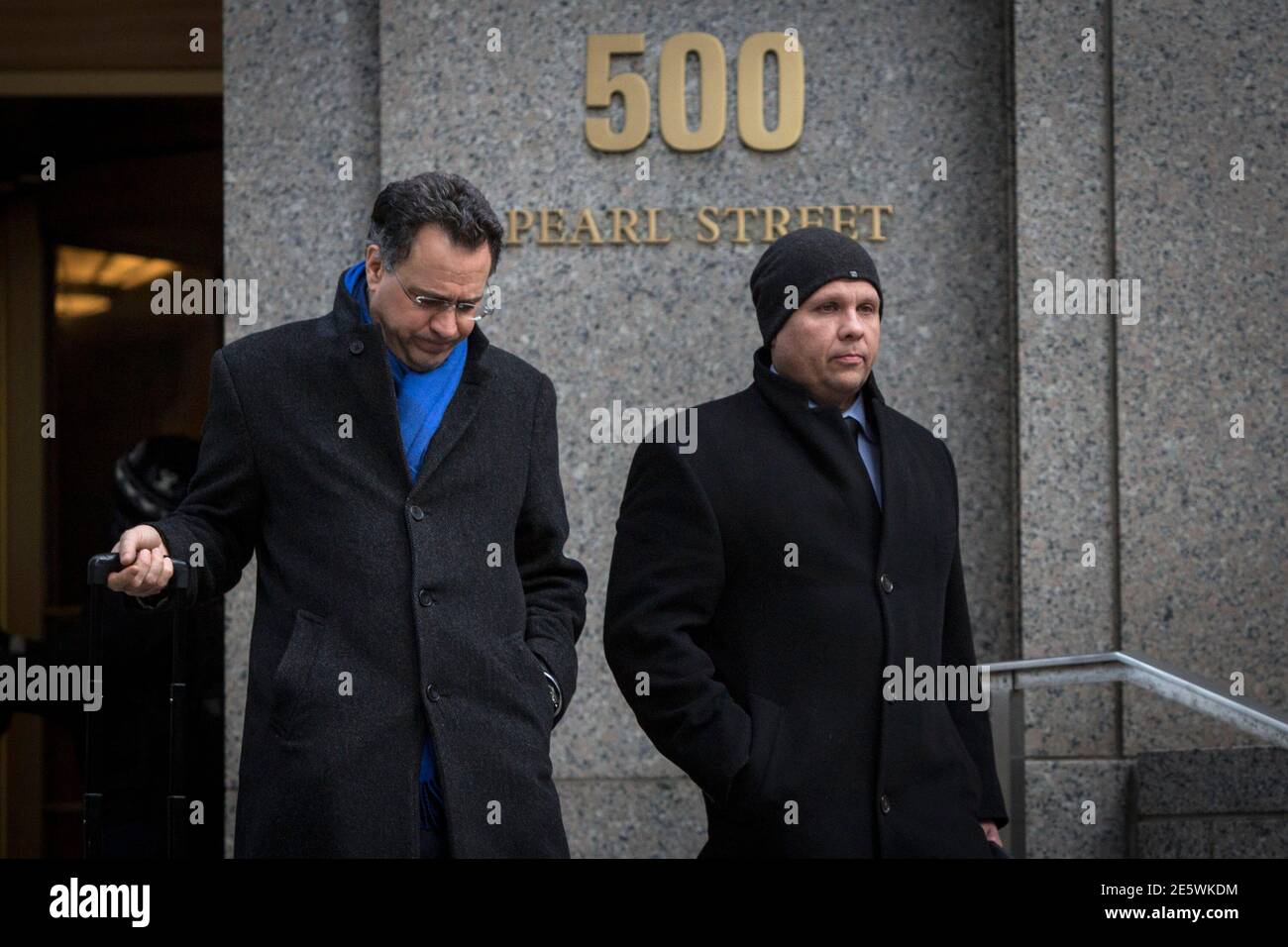 George Perez R A Computer Programmer For Bernard L Madoff Investment Securities Llc Exits The Manhattan Federal Court With His Lawyer Larry Krantz In New York March 24 14 Five Former Aides