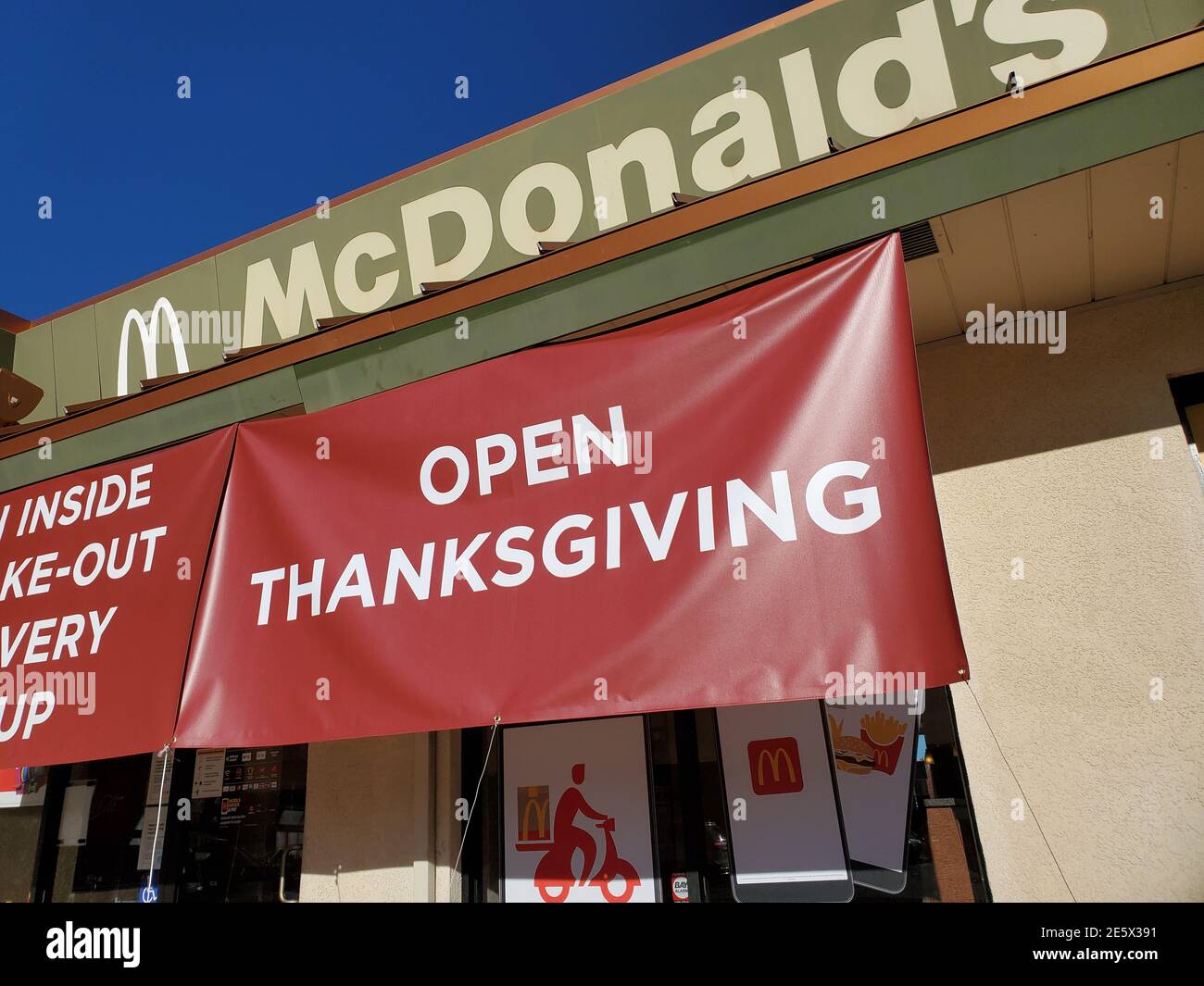 Photograph of a McDonald's restaurant featuring the McDonald's sign and