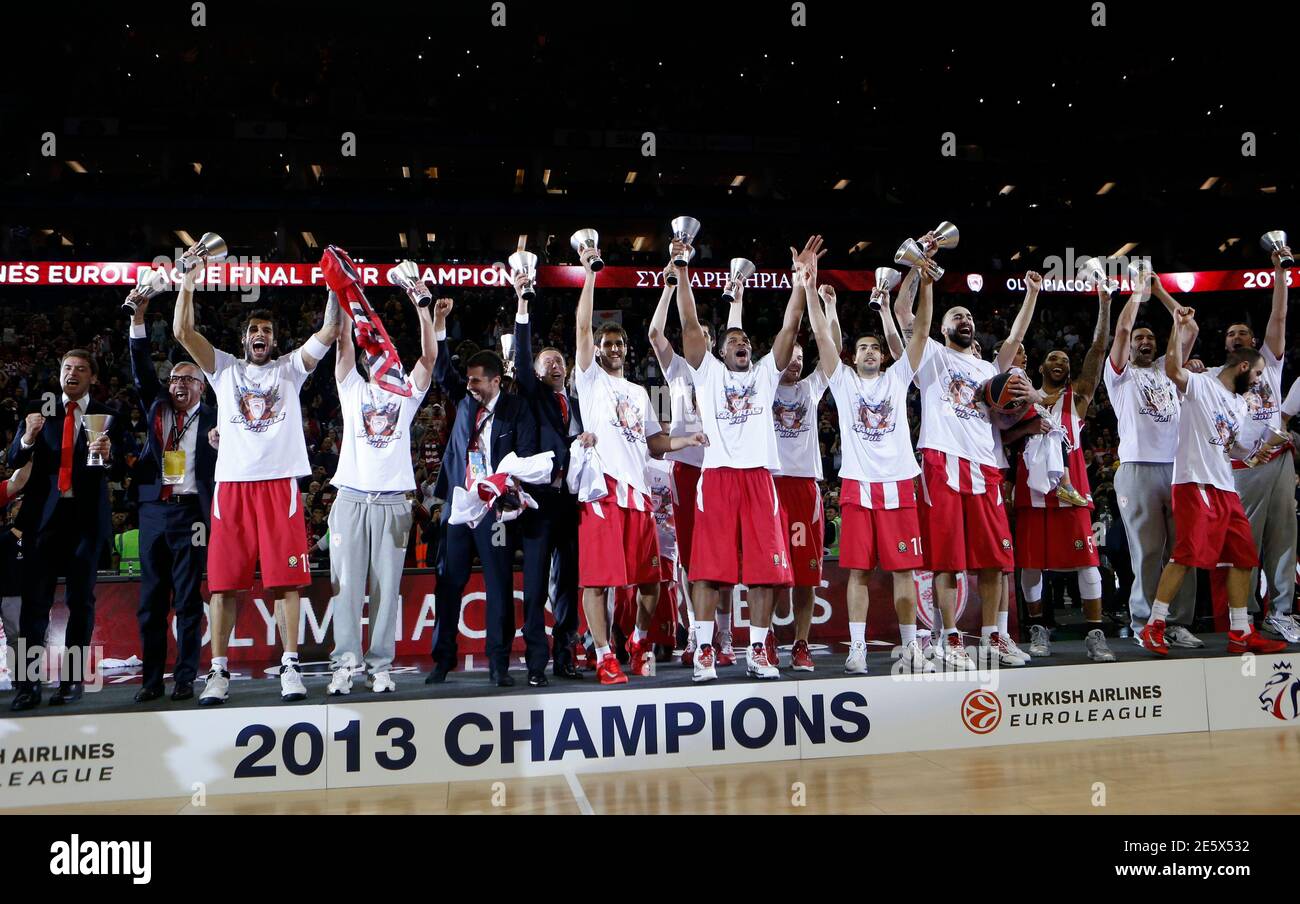 Olympiakos' players celebrate after winning the Euroleague Basketball Final  Four final game against Real Madrid at the O2 Arena in London May 12, 2013.  REUTERS/Suzanne Plunkett (BRITAIN - Tags: SPORT BASKETBALL Stock