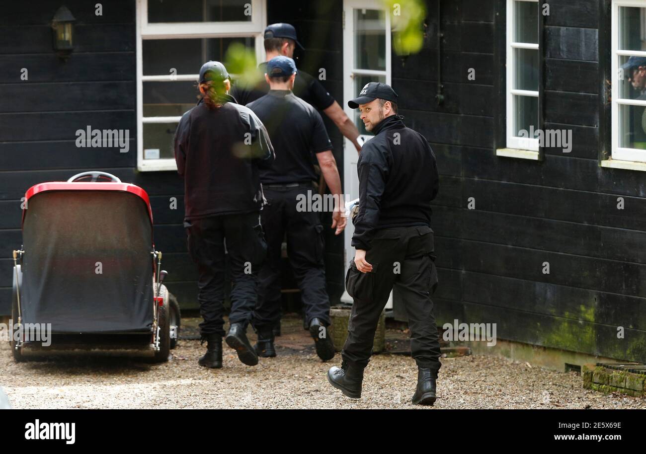 Police officers arrive at the house of Peaches Geldof the day after she was found dead at her home near Wrotham, southern England April 8, 2014. Geldof, second daughter of Band Aid founder and musician Bob Geldof and a media and fashion personality in her own right, has died at her home in Kent, southern England, aged 25, her family said on Monday. Kent police issued a statement saying the death of a 25-year-old woman, whom they did not identify, was being treated as a 'non-suspicious but unexplained sudden death'. REUTERS/Olivia Harris (BRITAIN - Tags: SOCIETY) Stock Photo
