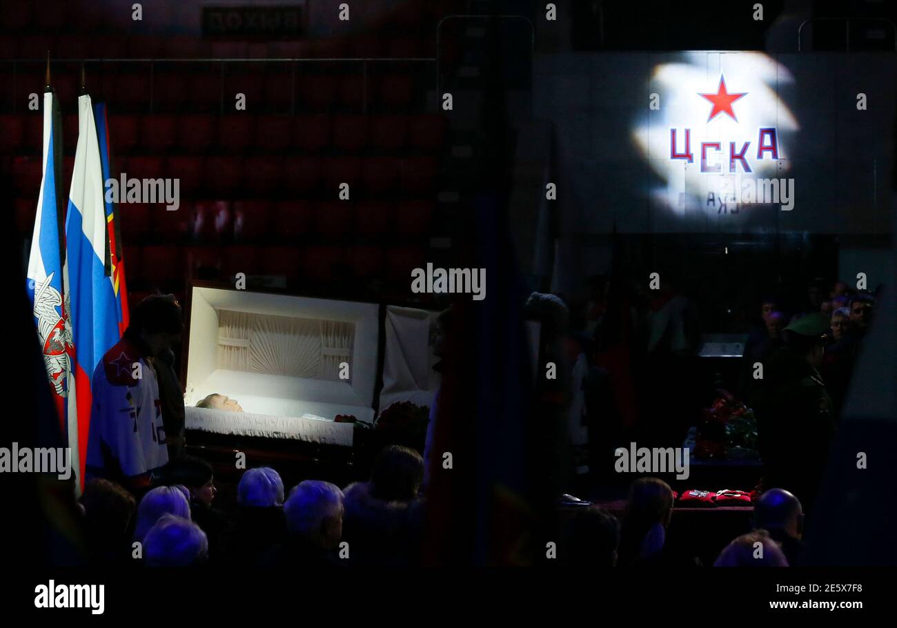 https www alamy com people surround a coffin with the body of former ice hockey coach viktor tikhonov during a funeral ceremony in moscow november 27 2014 tikhonov who coached the soviet union and unified team to three straight olympic ice hockey gold medals has died in moscow at the age of 84 in addition to winning gold at the 1984 1988 and 1992 olympics tikhonov claimed eight world championship titles as a coach reutersmaxim shemetov russia tags sport ice hockey obituary image399488412 html