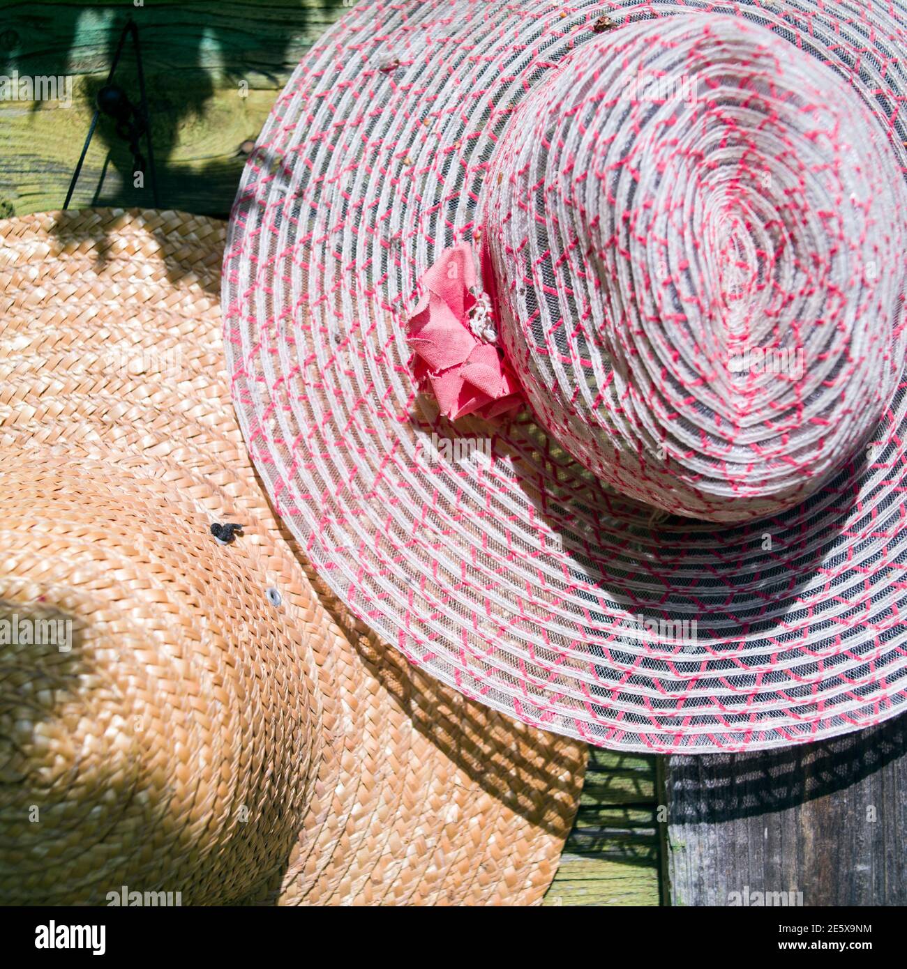 two wide brimmed hats, close up outdoor still life Stock Photo