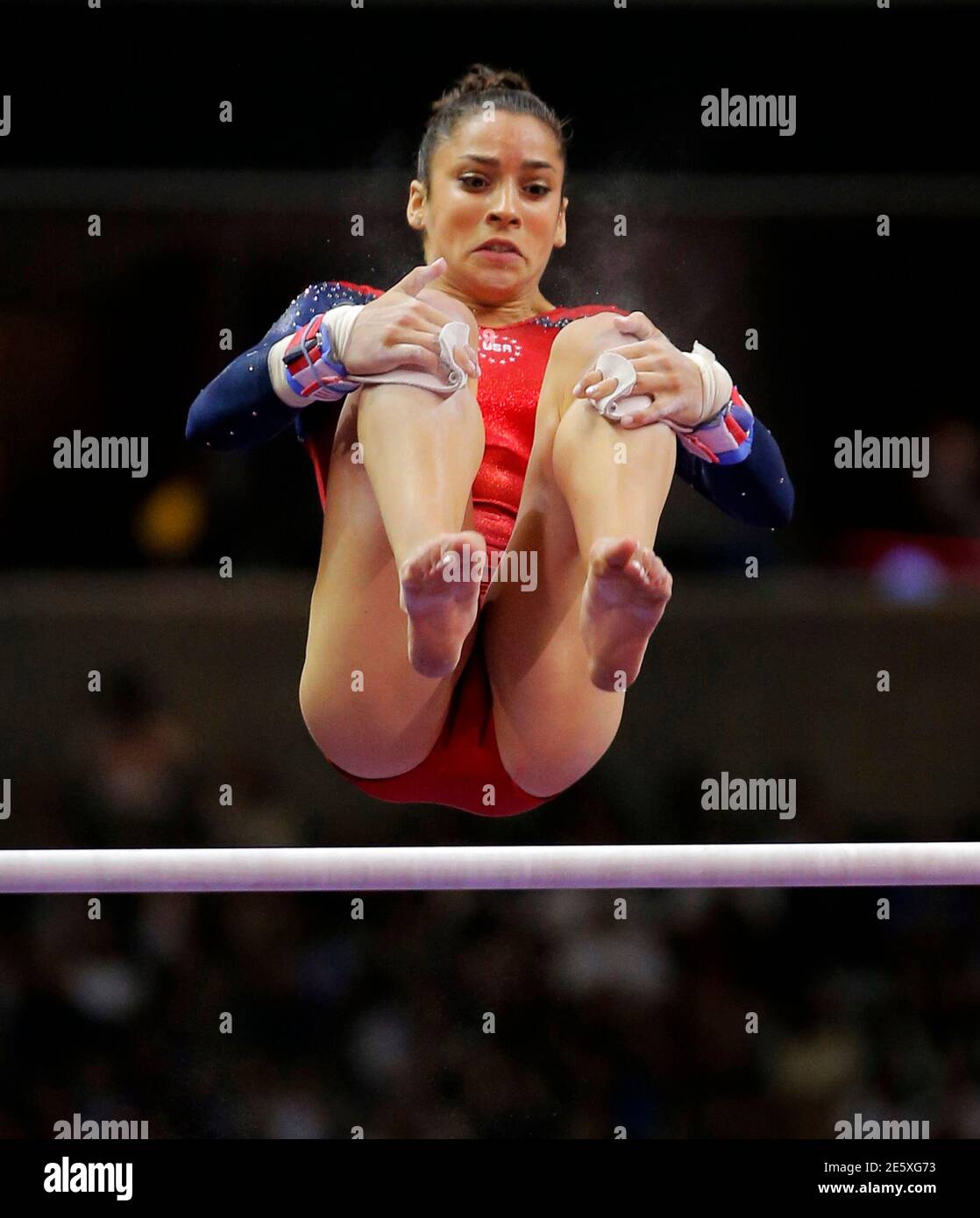 U.S. gymnast Alexandra Raisman competes on the uneven bars at the U.S.  Olympic gymnastics trials in San Jose, California July 1, 2012.  REUTERS/Brian Snyder (UNITED STATES - Tags: SPORT GYMNASTICS OLYMPICS Stock