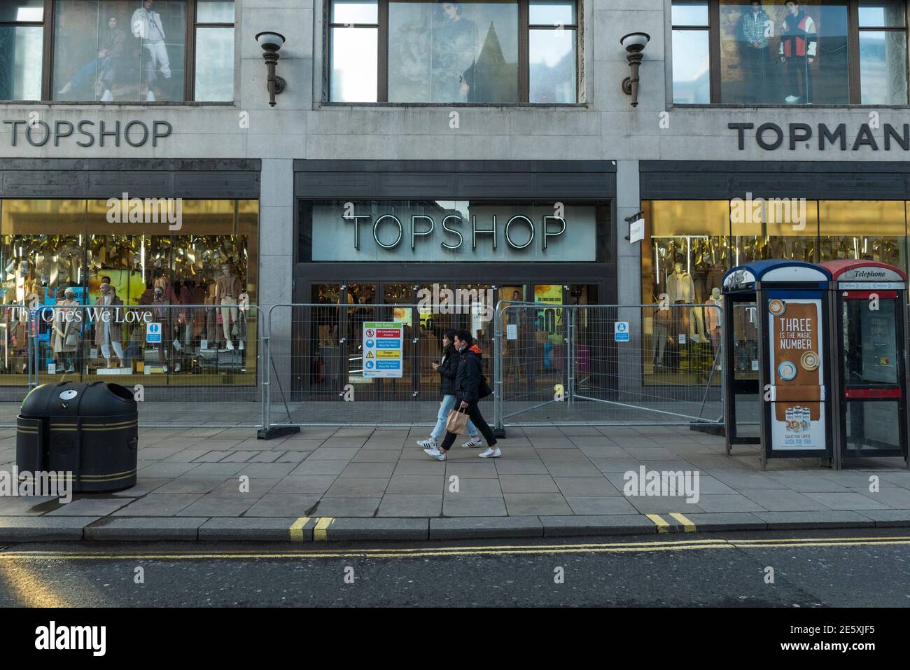 London, UK. 28 January 2021. Construction fencing surrounds the flagship of  Topshop on Oxford Street, the traditional home of retail in the West End.  Online retailer Asos is reported to be interested