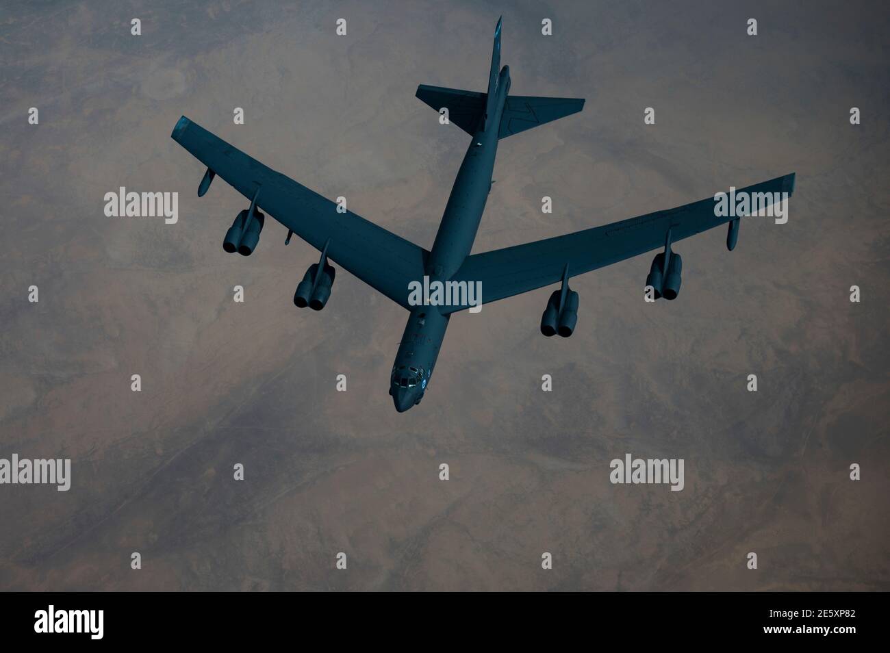 Persian Gulf, Saudi Arabia. 27th Jan, 2021. A U.S. Air Force B-52 Stratofortress strategic bomber from the 2nd Bomb Wing flies over the desert after refueling from a KC-135 Stratotanker during a short-duration deployment to the middle east January 27, 202 over the Persian Gulf. Credit: Planetpix/Alamy Live News Stock Photo