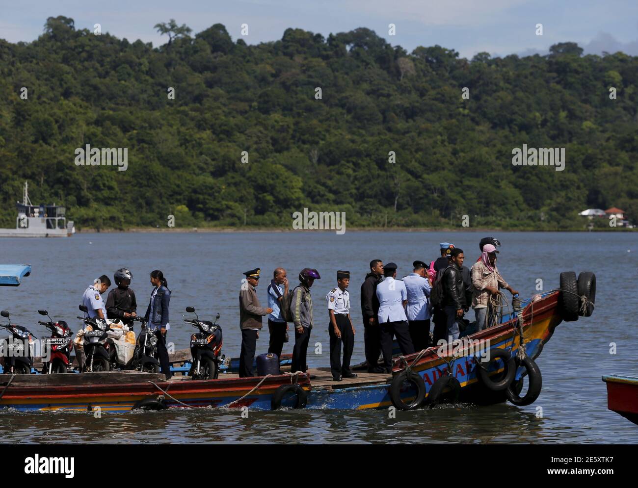 lukke fire ribben Department of Justice officials stand on a boat after visting the prison  island of Nusa Kambangan in Cilacap, Central Java island, Indonesia, April  27, 2015. Australia made a last-minute plea on Monday