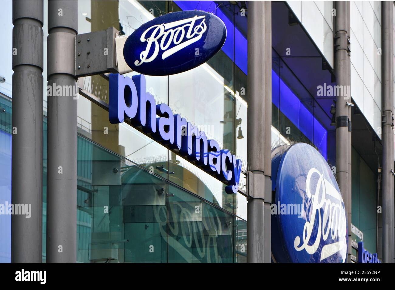 London, United Kingdom - February 01, 2019: Typical blue oval sign at one  of many Boots branches in London. Boots is a health and beauty pharmacy  chai Stock Photo - Alamy