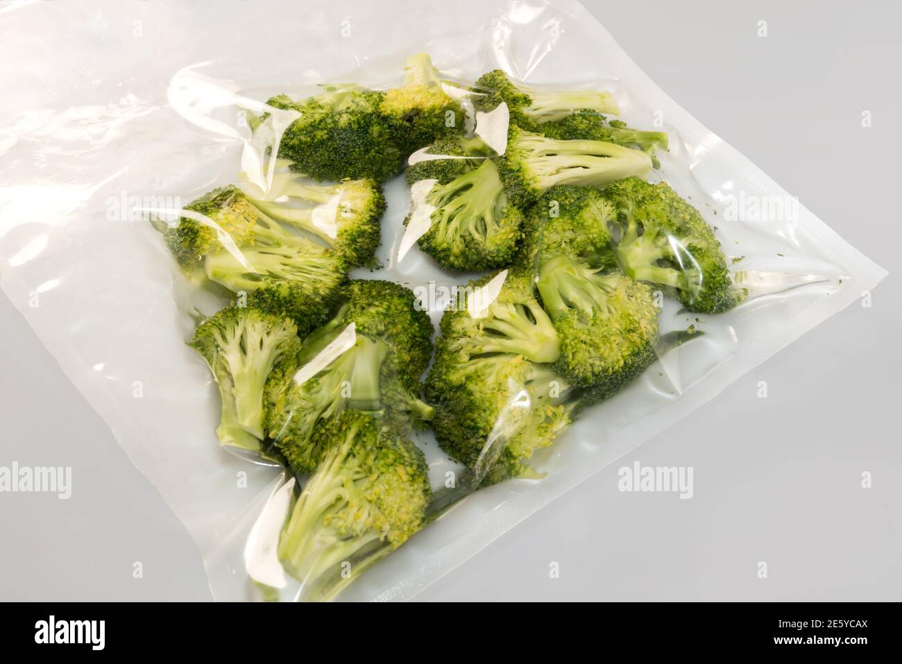 broccoli vegetable vacuum packed sealed for sous vide cooking on gray  background Stock Photo - Alamy