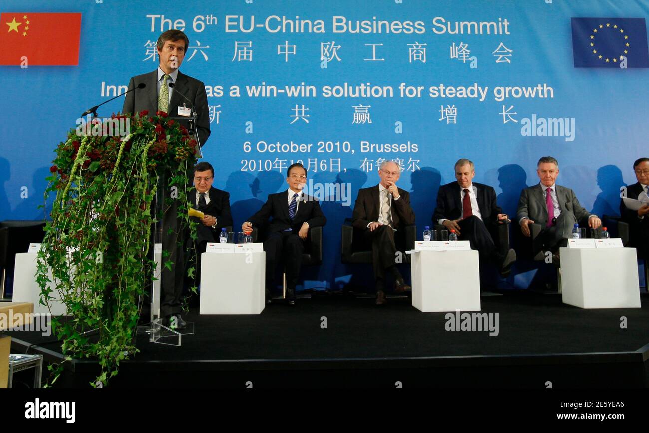 China's Premier Wen Jiabao (3rd L) listens to the speech of Pierre-Olivier Beckers (L), Belgium's Enterprises Federation VBO-FEB Chairman, during the 6th EU-China Business Summit in Brussels October 6, 2010.    REUTERS/Yves Herman   (BELGIUM - Tags: POLITICS BUSINESS) Stock Photo