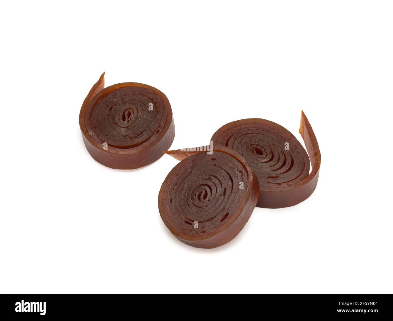 Fruit rolls pastille. Fruit candy rolls. Shredded and dried fruits