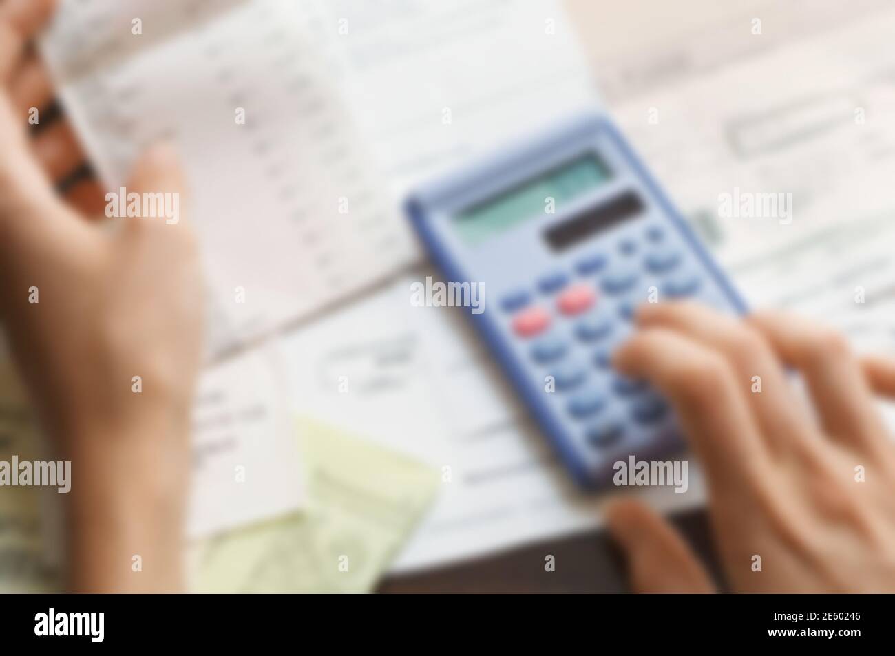 Extreme closeup of expenses being calculated Stock Photo
